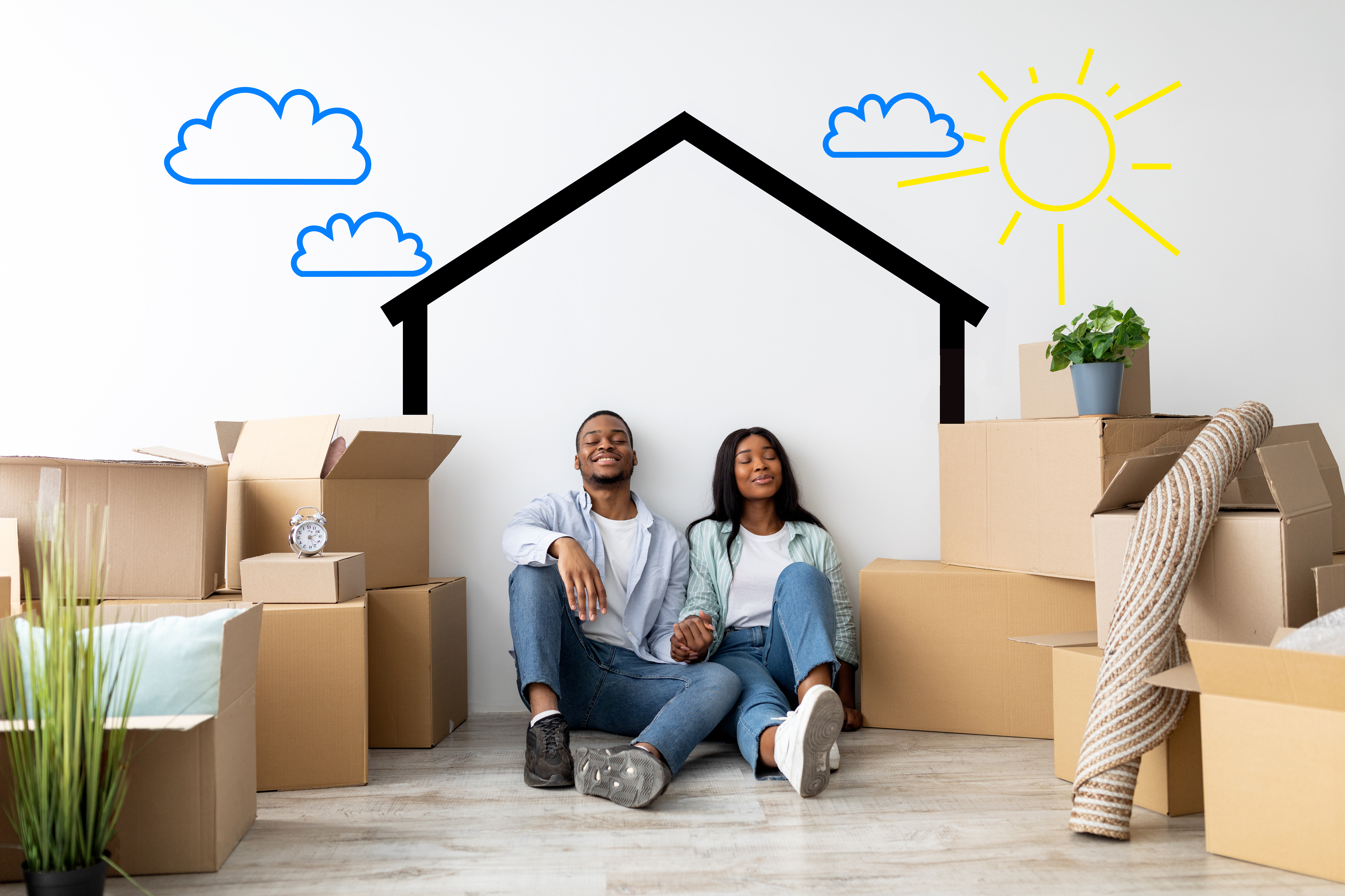 Loving african american spouses relocating to their home, dreaming about renovation, sitting near wall with drawn house Loving african american spouses relocating to their home, dreaming about renovation, sitting near wall with drawn house