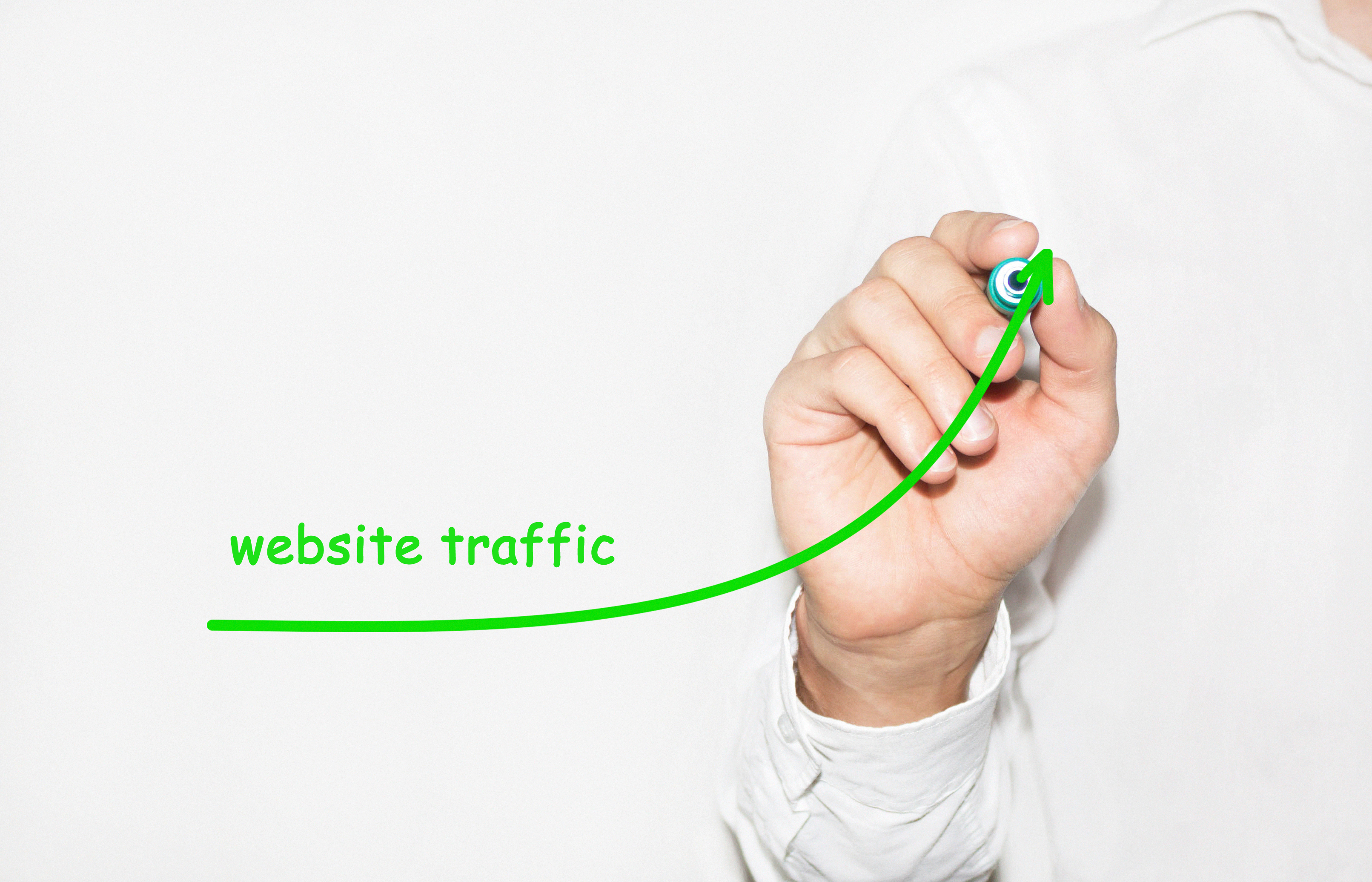 Businessman draw growing graph symbolize growing website traffic