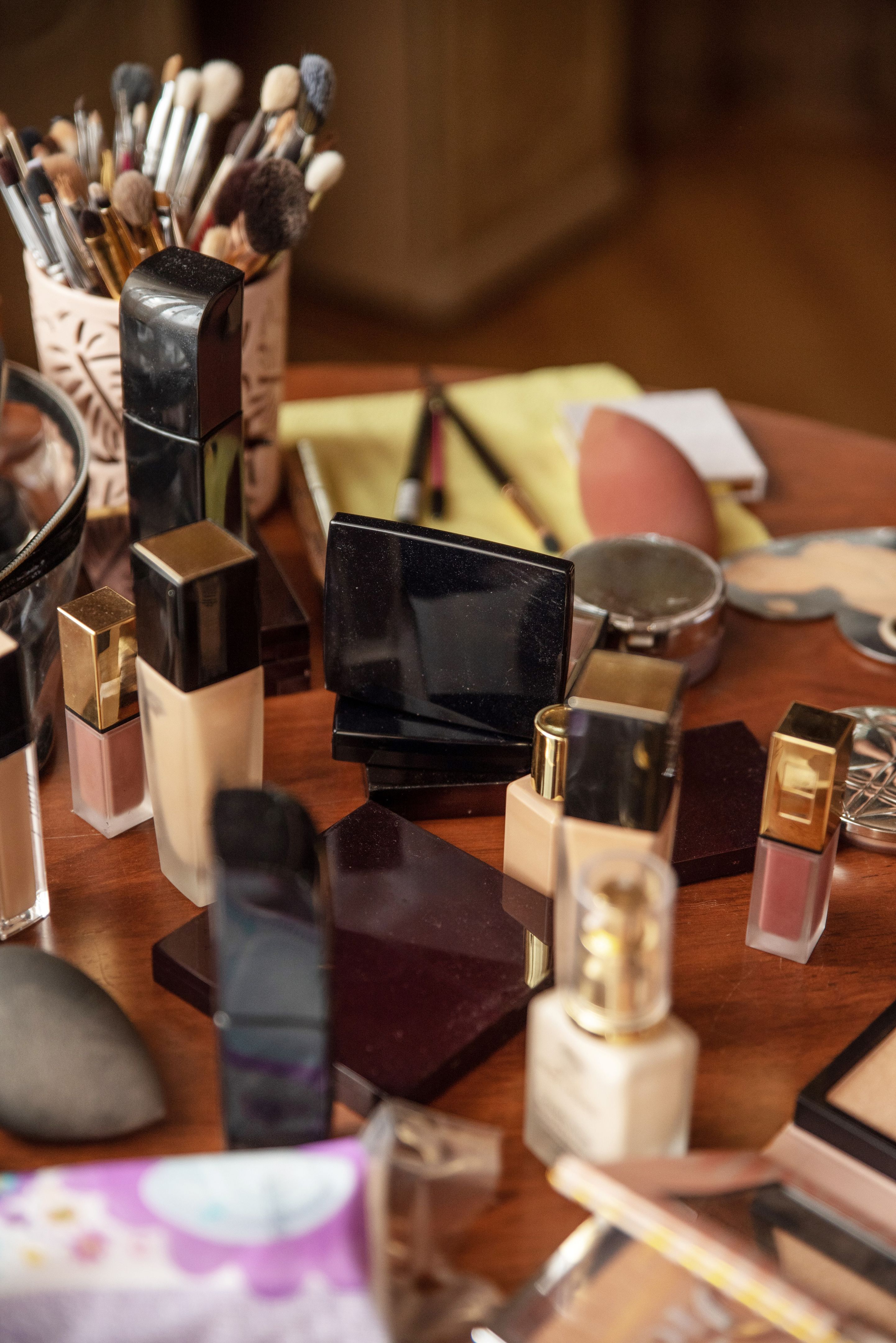 Luxury cosmetics on wooden table