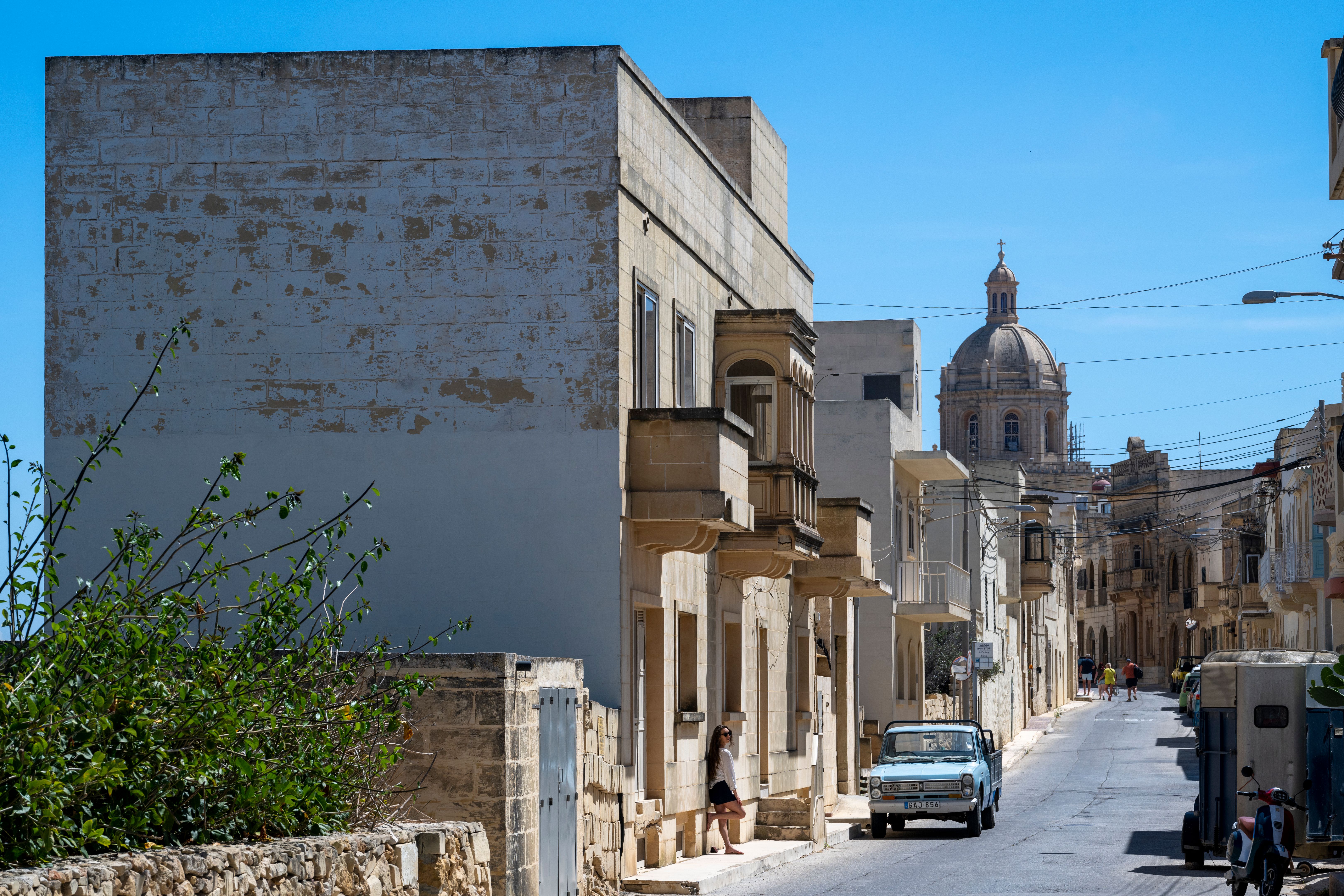 Woman explores old town Woman explores old town