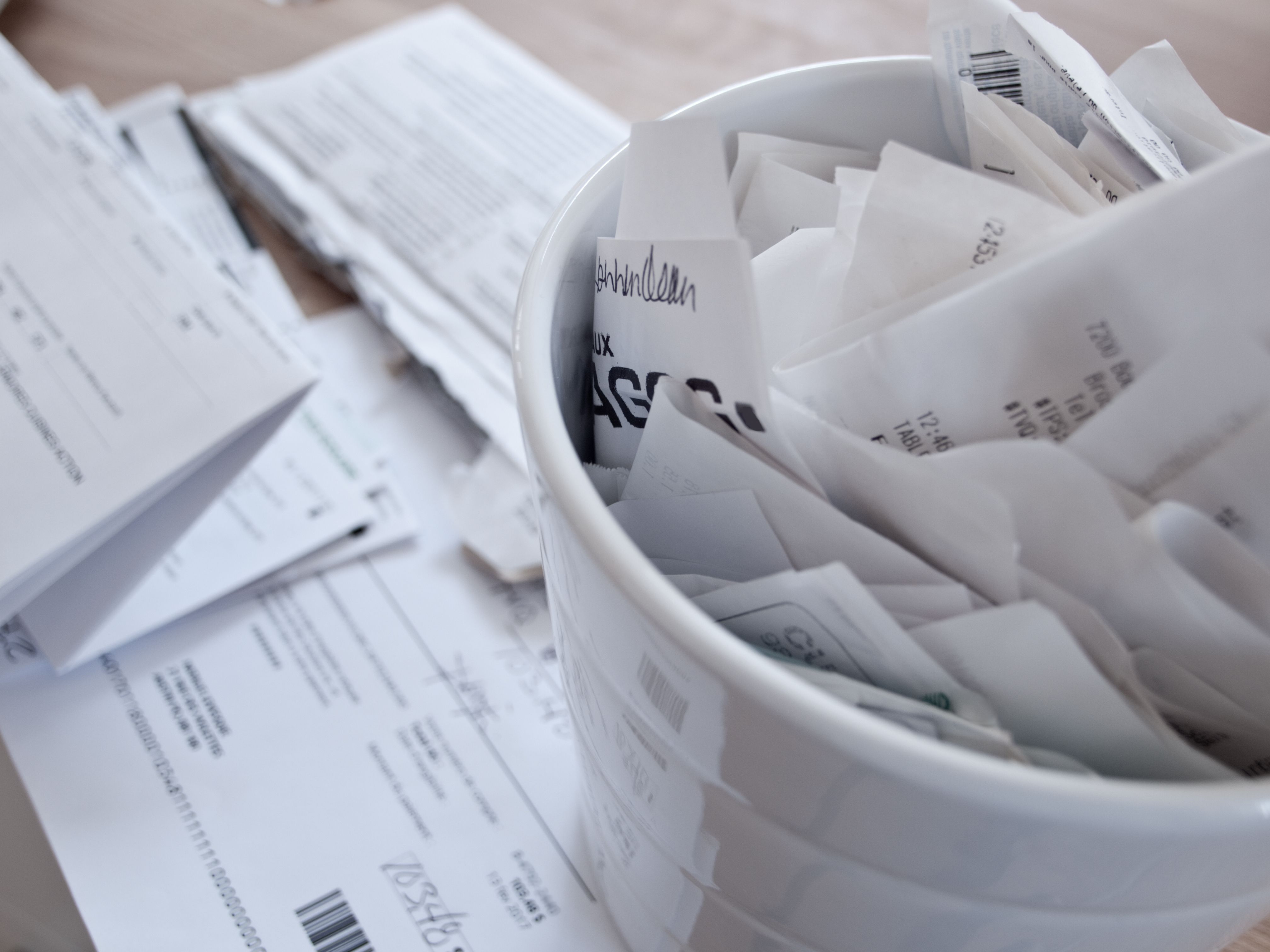 tax documents and receipts spread on a table tax documents and receipts spread on a table
