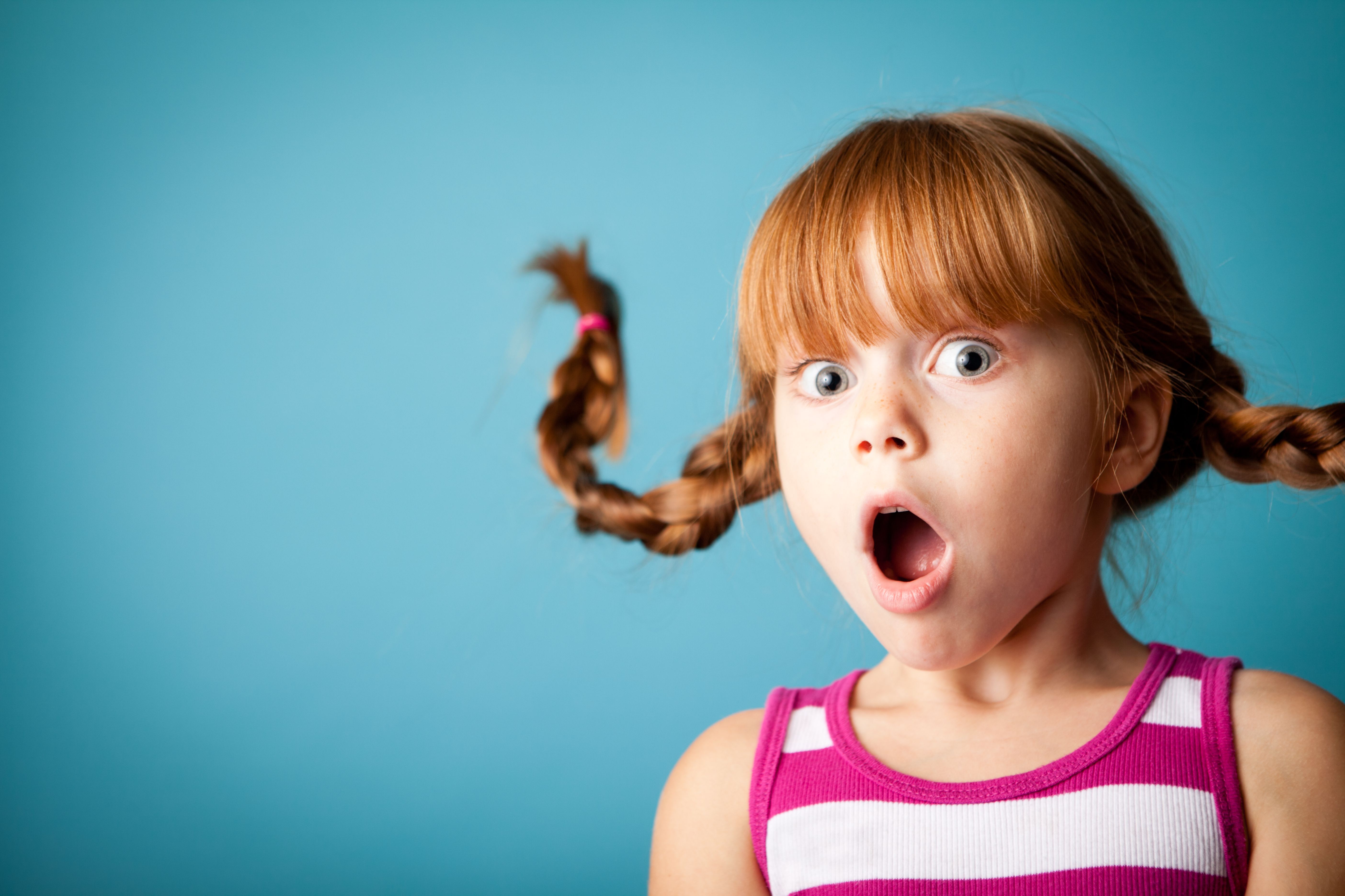 Red-Haired Girl with Upward Braids and Look of Surprise Red-Haired Girl with Upward Braids and Look of Surprise