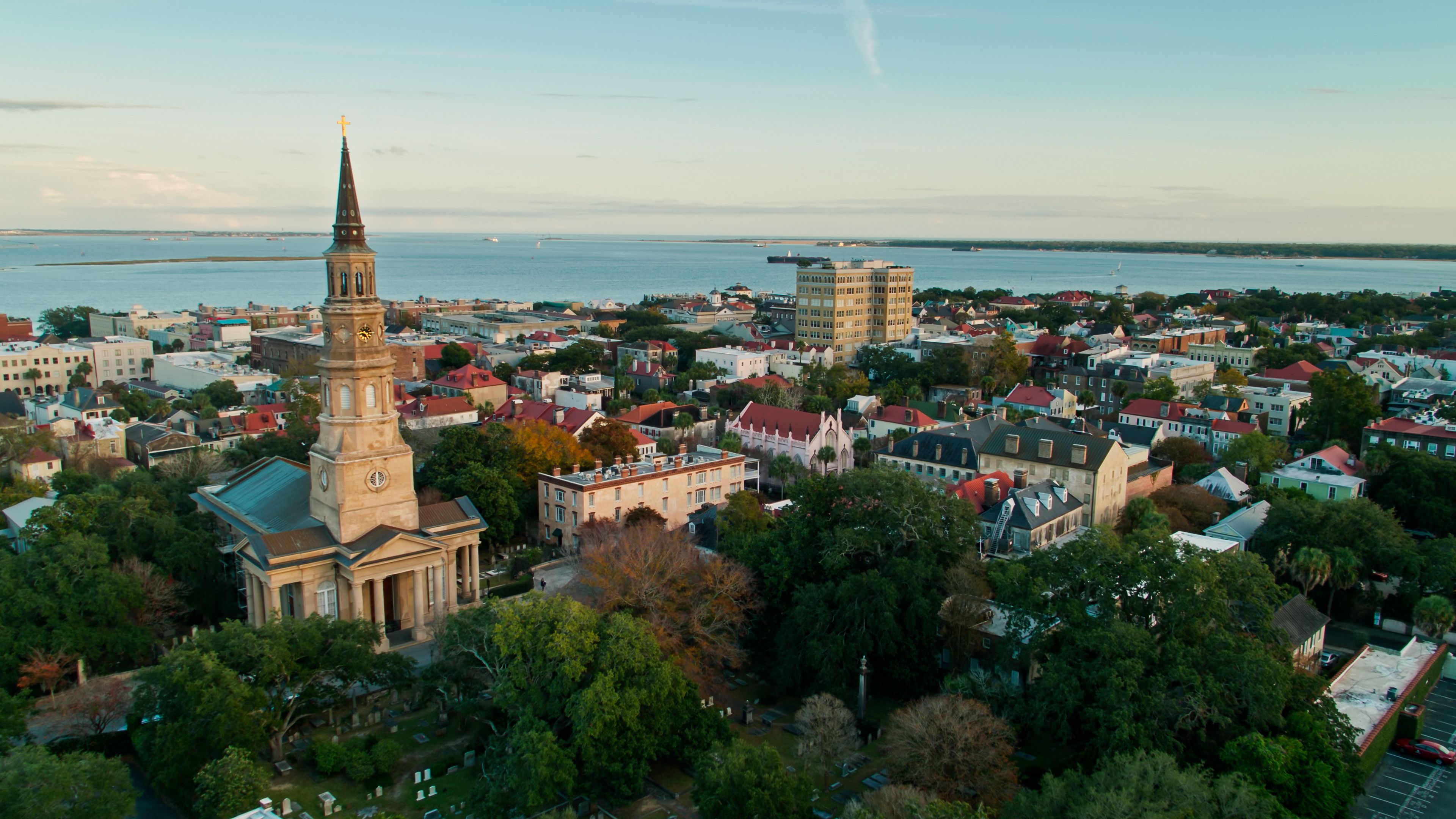 Aerial View Over Rooftops of Charleston, South Carolina at Sunset