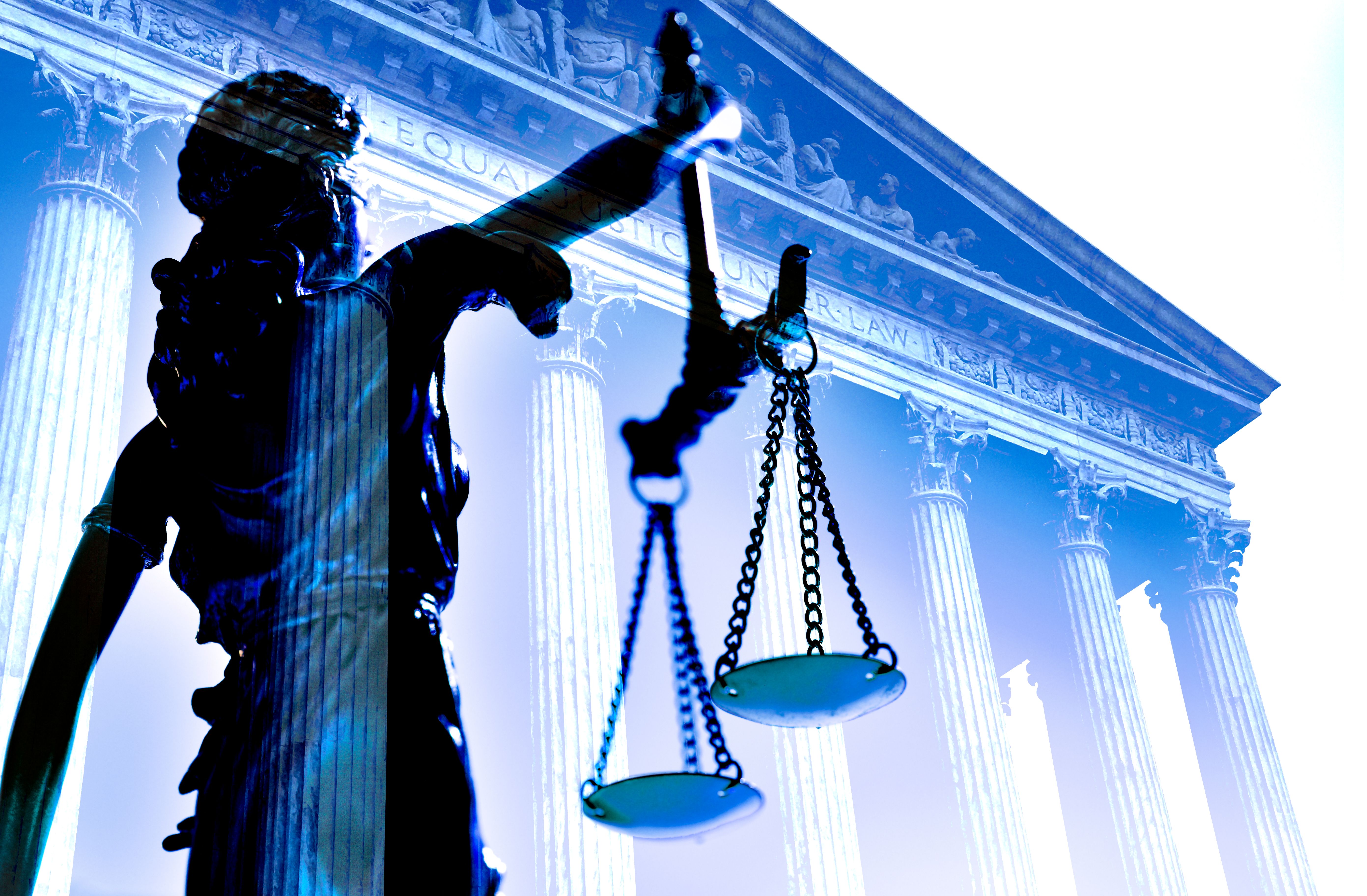 Lady Justice And U.S. Supreme Court Building