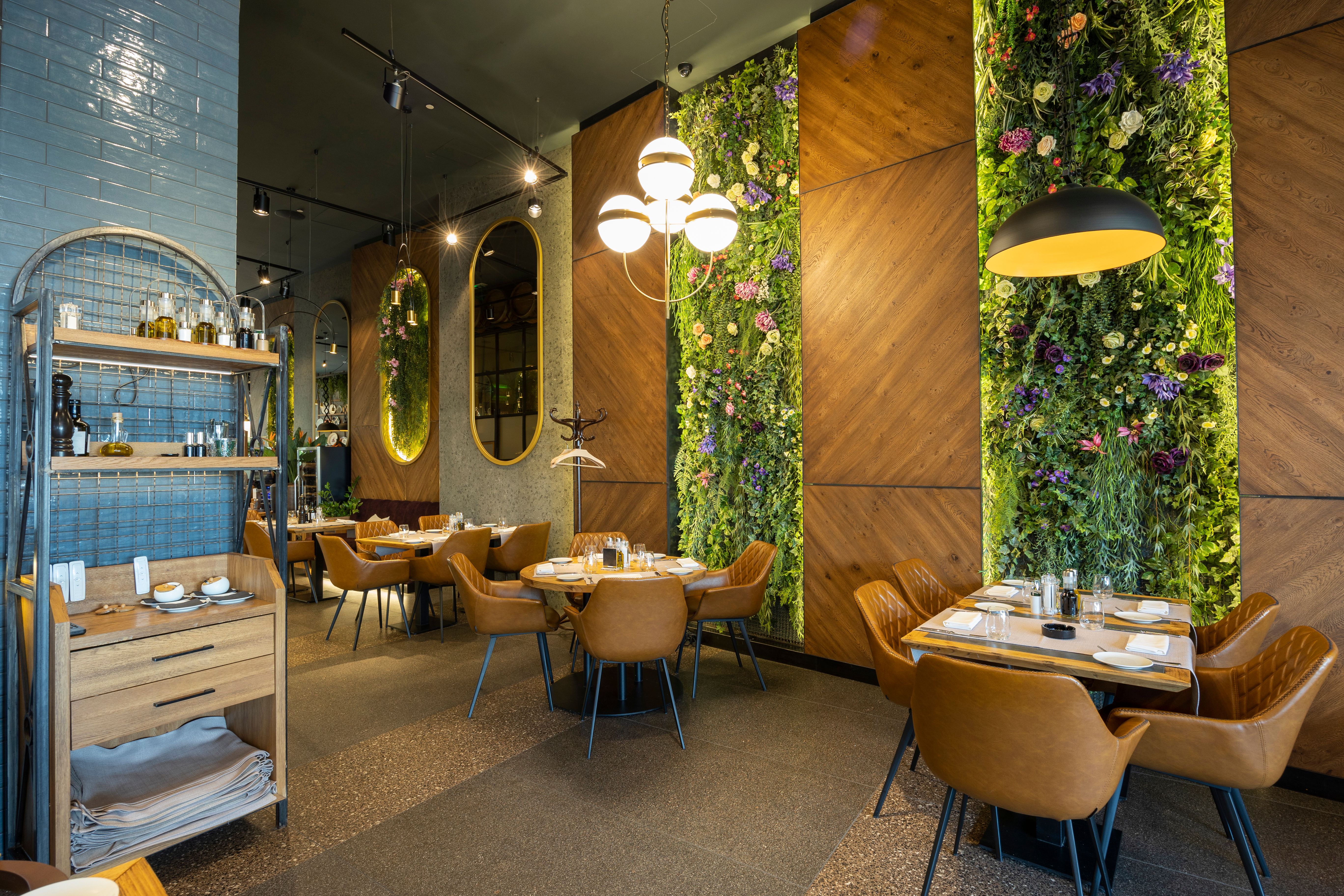 Interior of a luxury restaurant with flower decorated walls