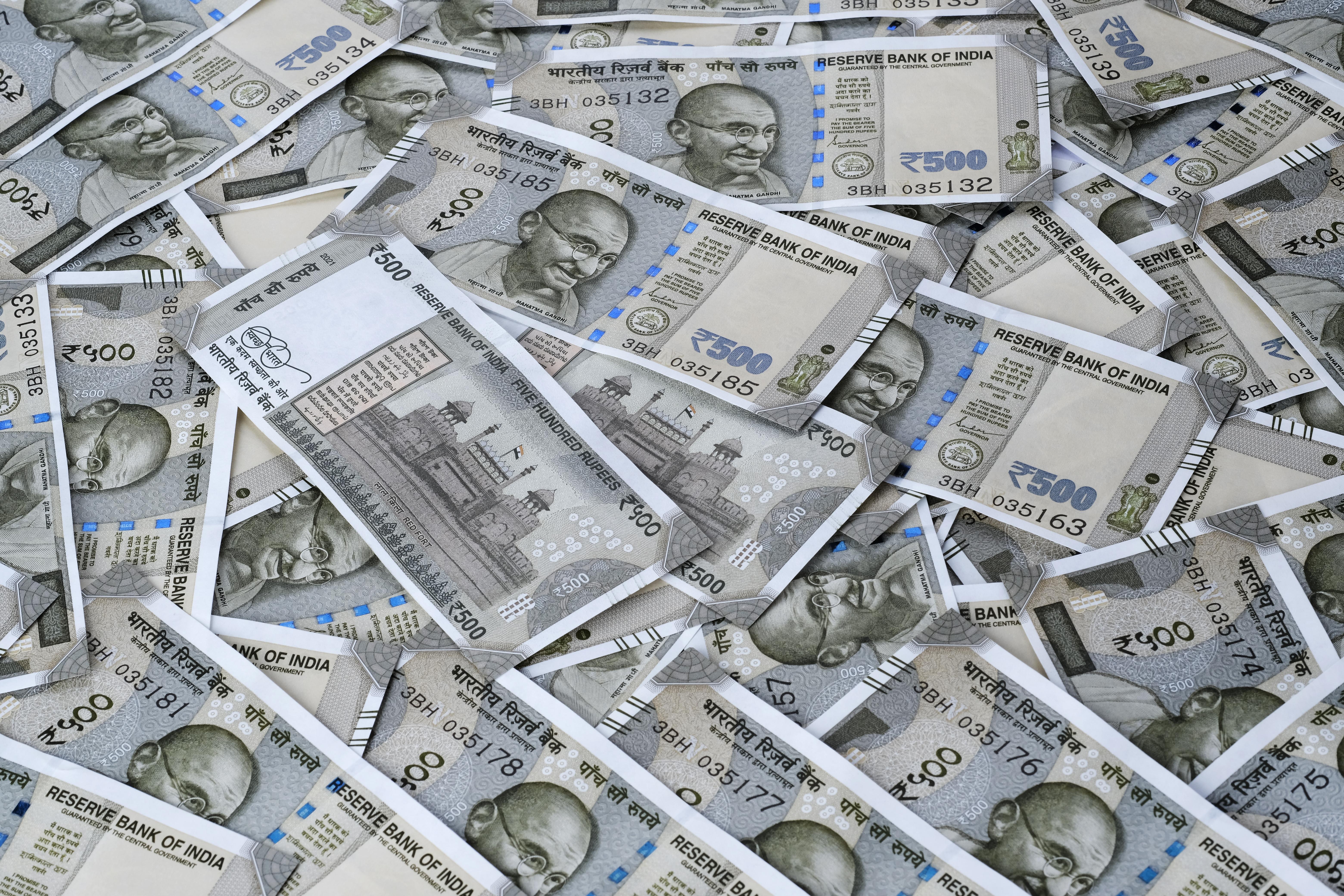 16 May 2023, Pune, India, Indian currency 500 rupees banknotes, business background India economy finance concept. 16 May 2023, Pune, India, Indian currency 500 rupees banknotes, business background India economy finance concept.