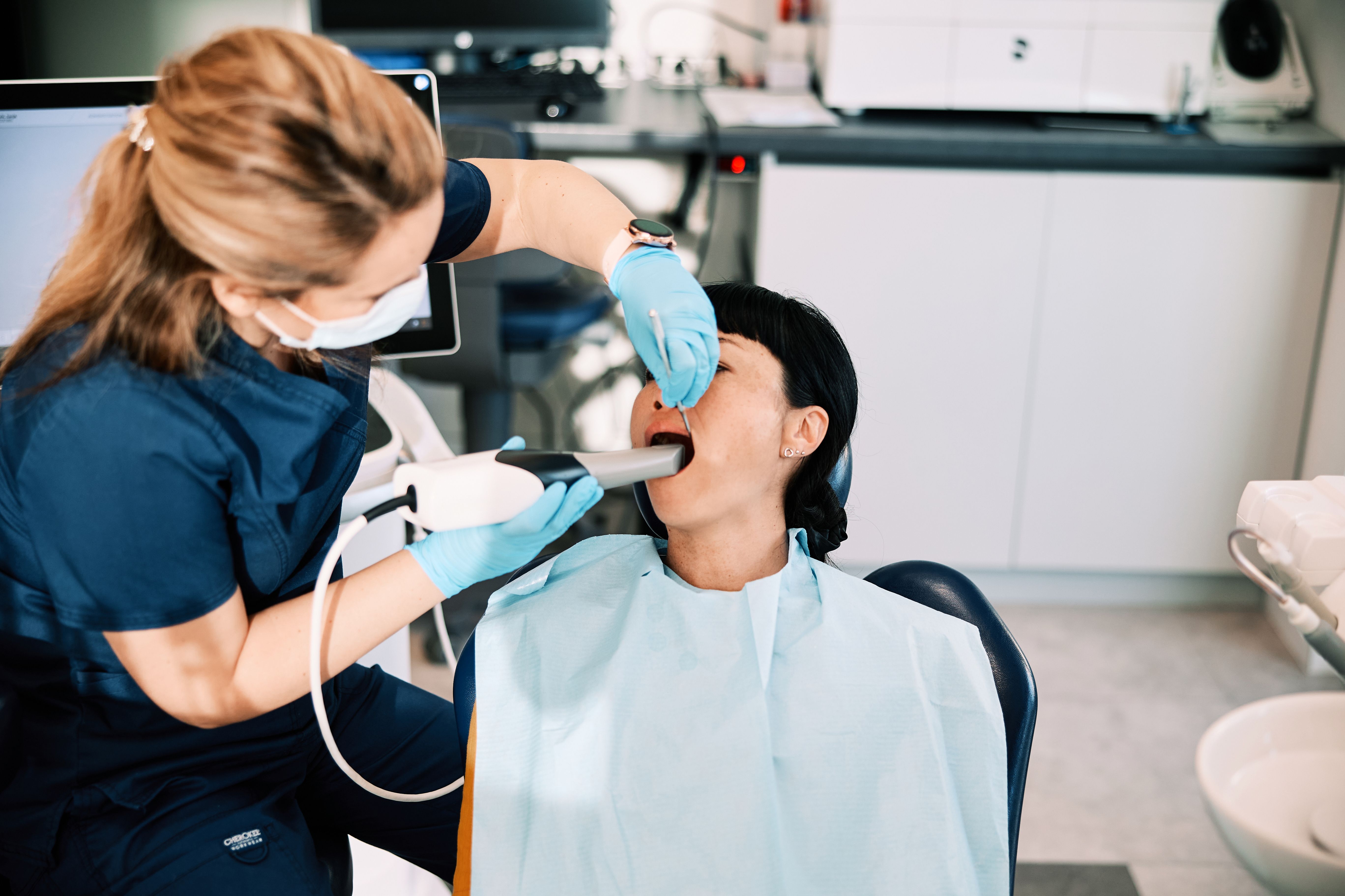 Japanese Woman Receiving Dental Care in Modern Clinic