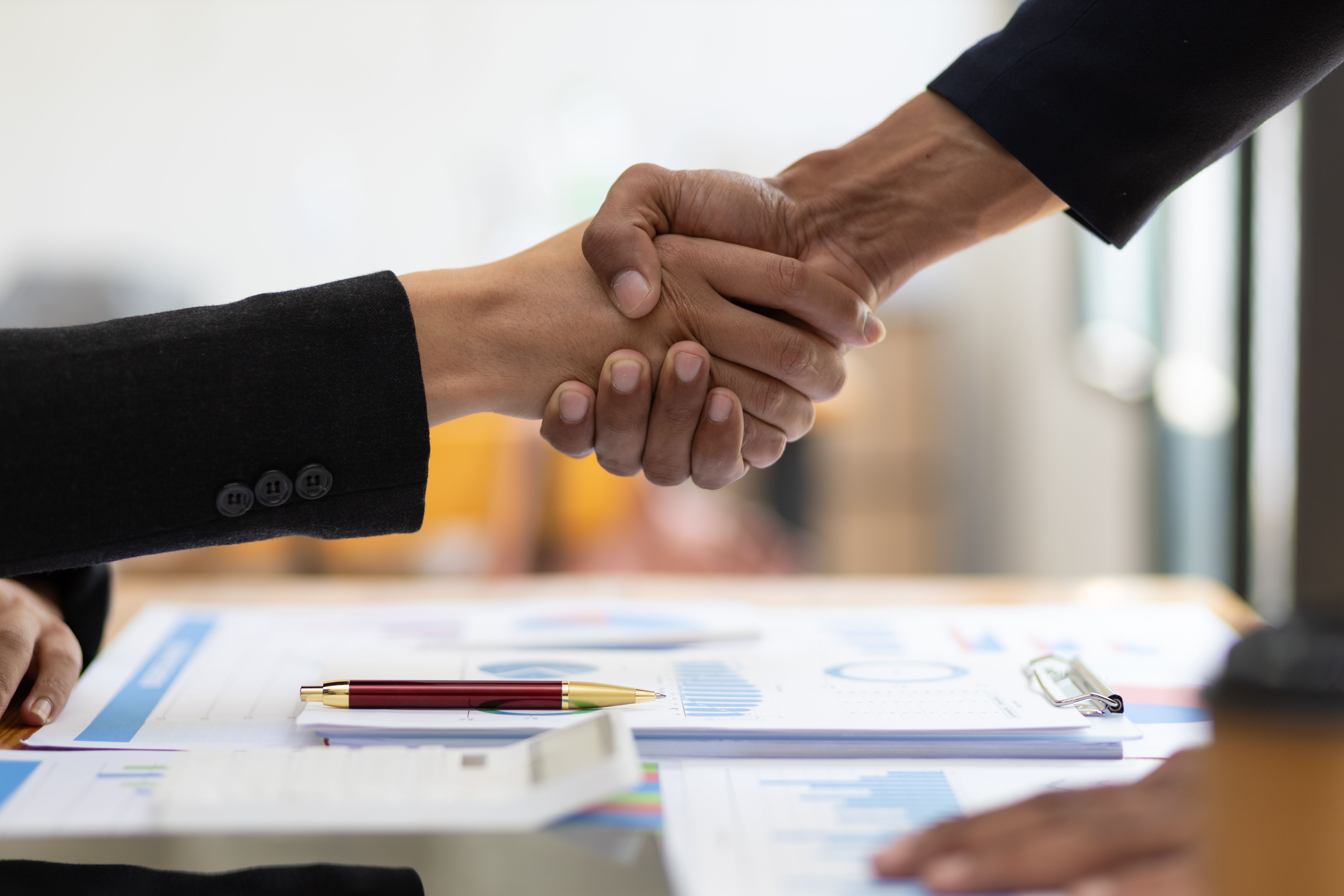 Handshake, Business cooperation at a meeting of business people.