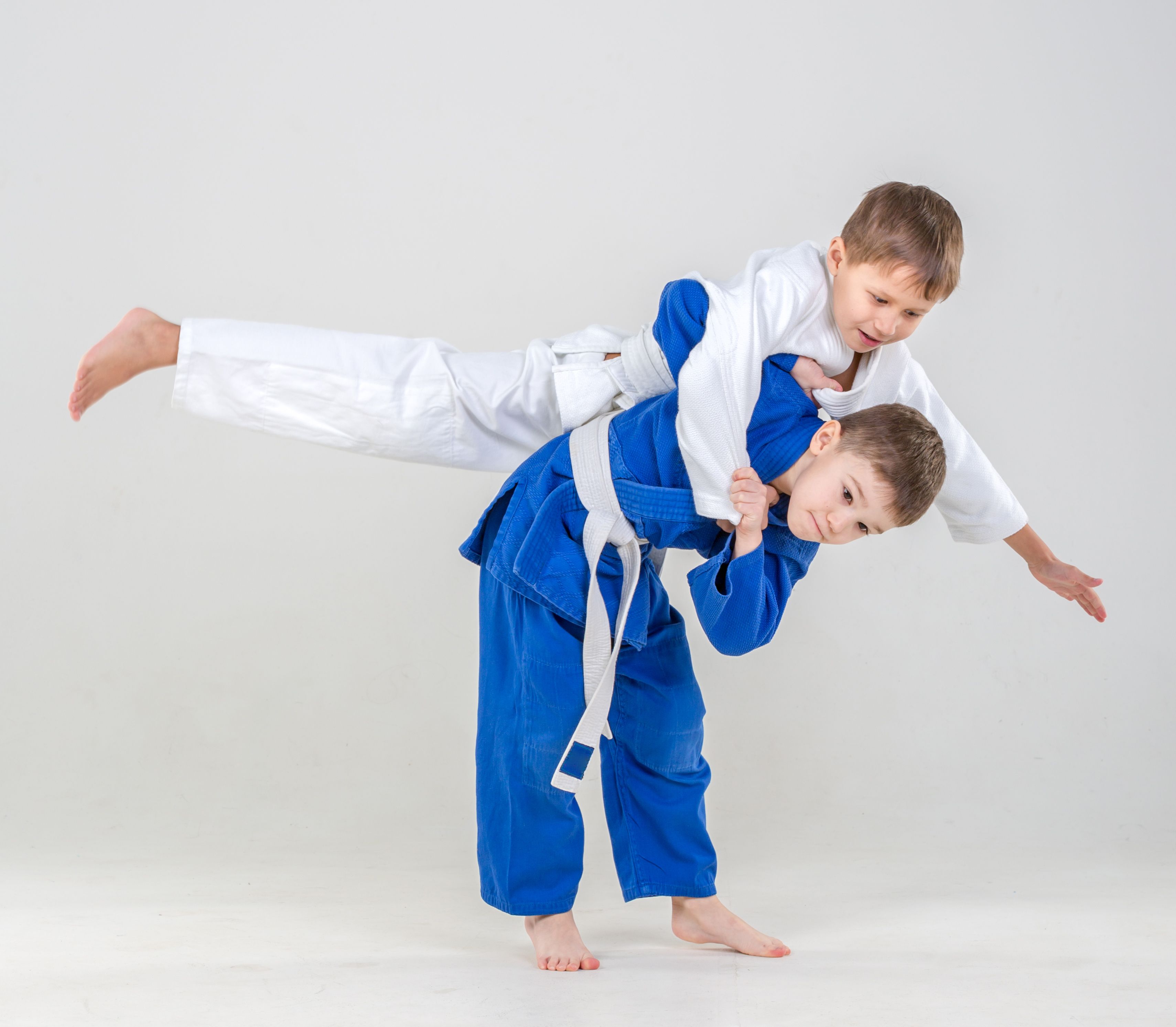 child practicing martial arts