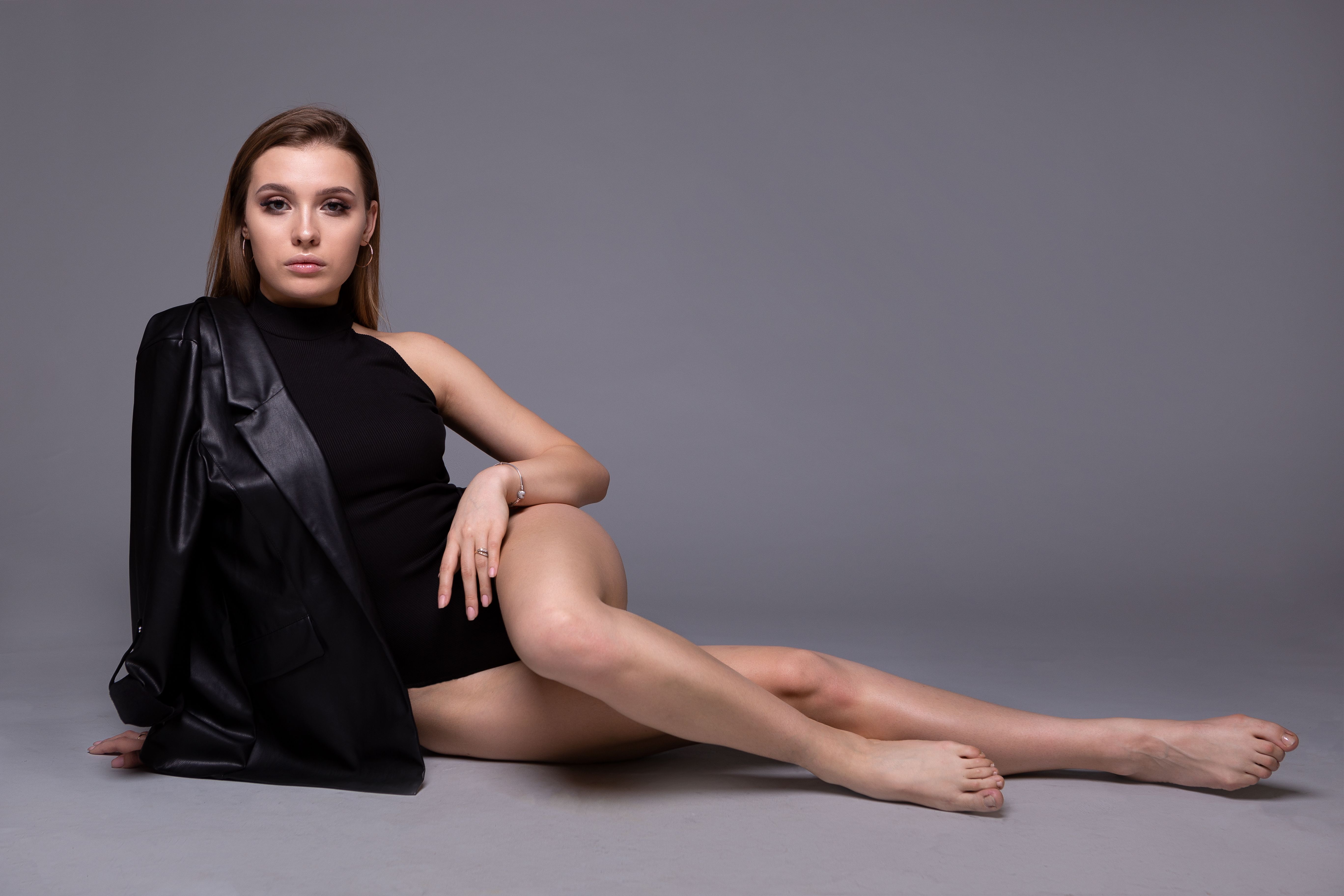 Sexy young Girl with a perfect body in black wear.