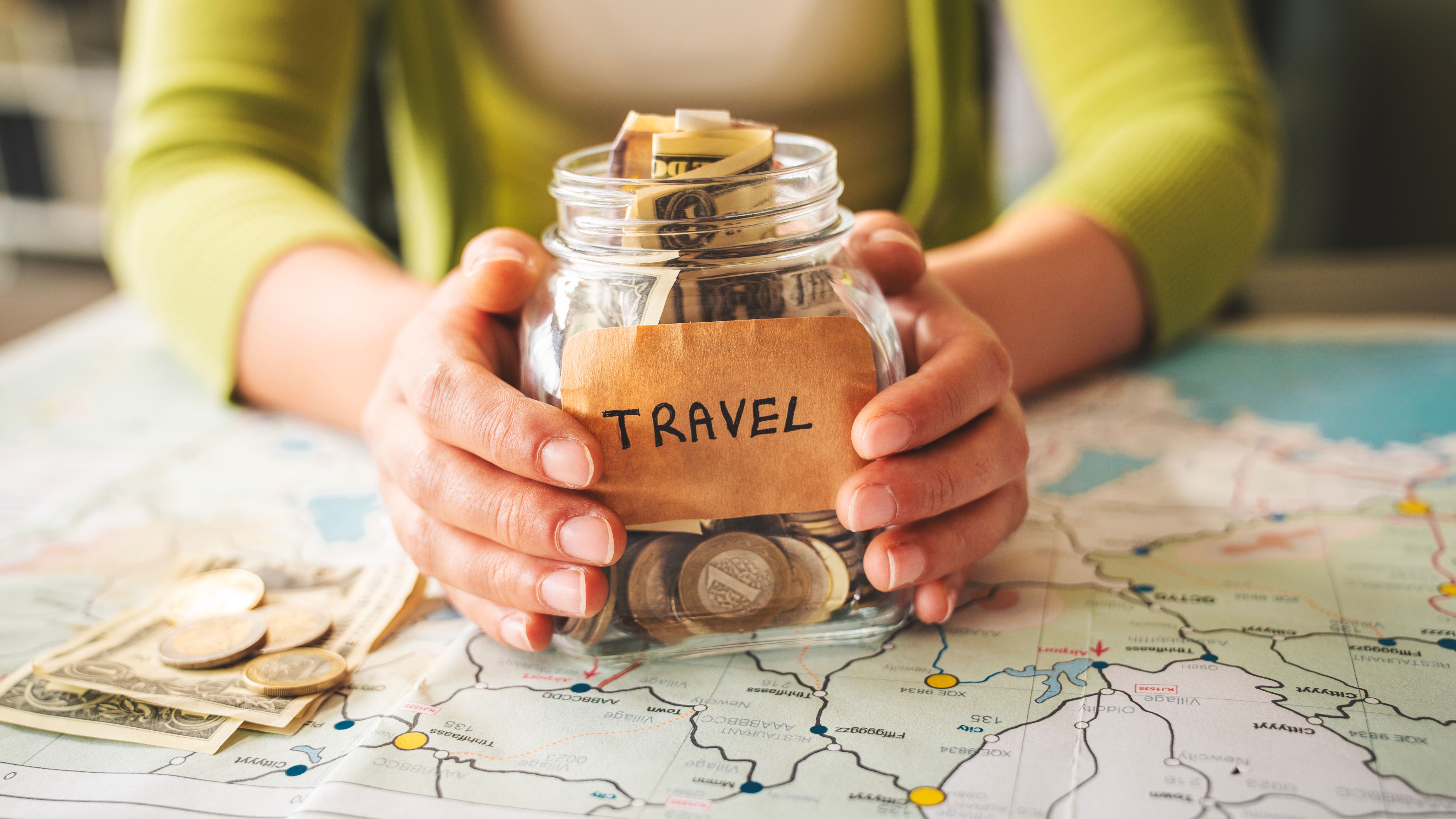 Saving money for travel and budget concept