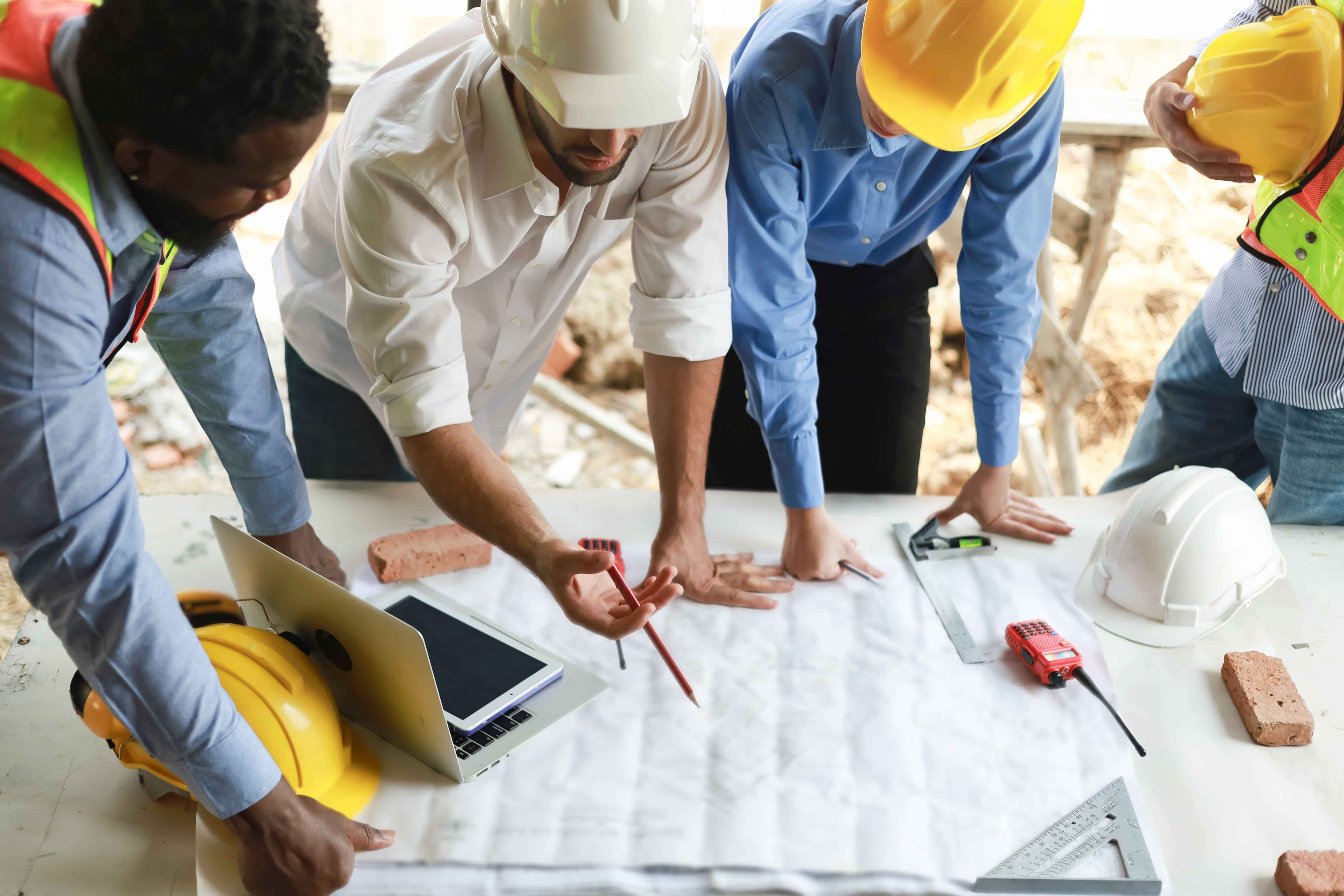 team planning home restoration