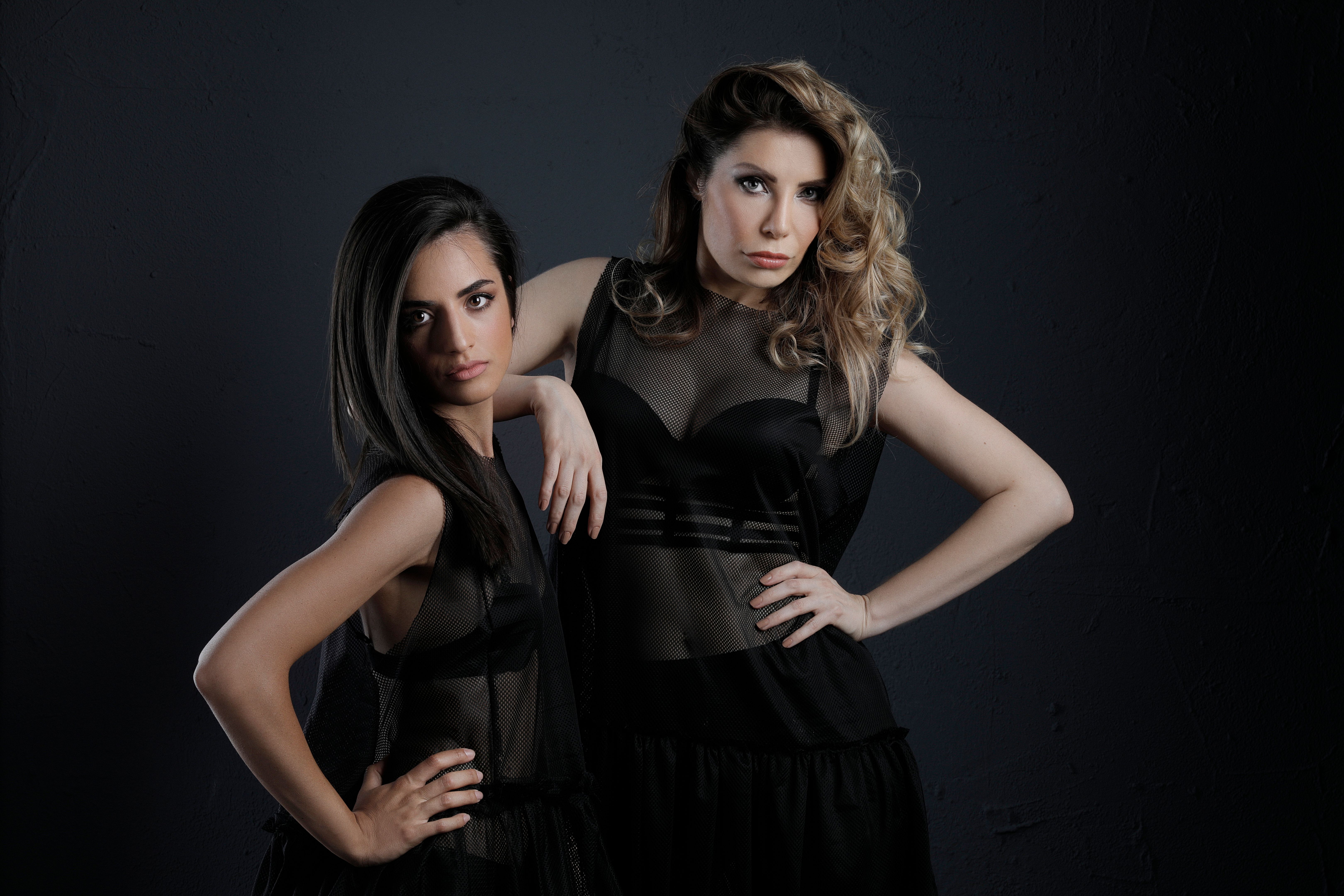 Couple Fashion portrait Two Beautiful modern women dressed elegantly Lifestyles Couple Fashion portrait Two Beautiful modern women dressed elegantly Lifestyles