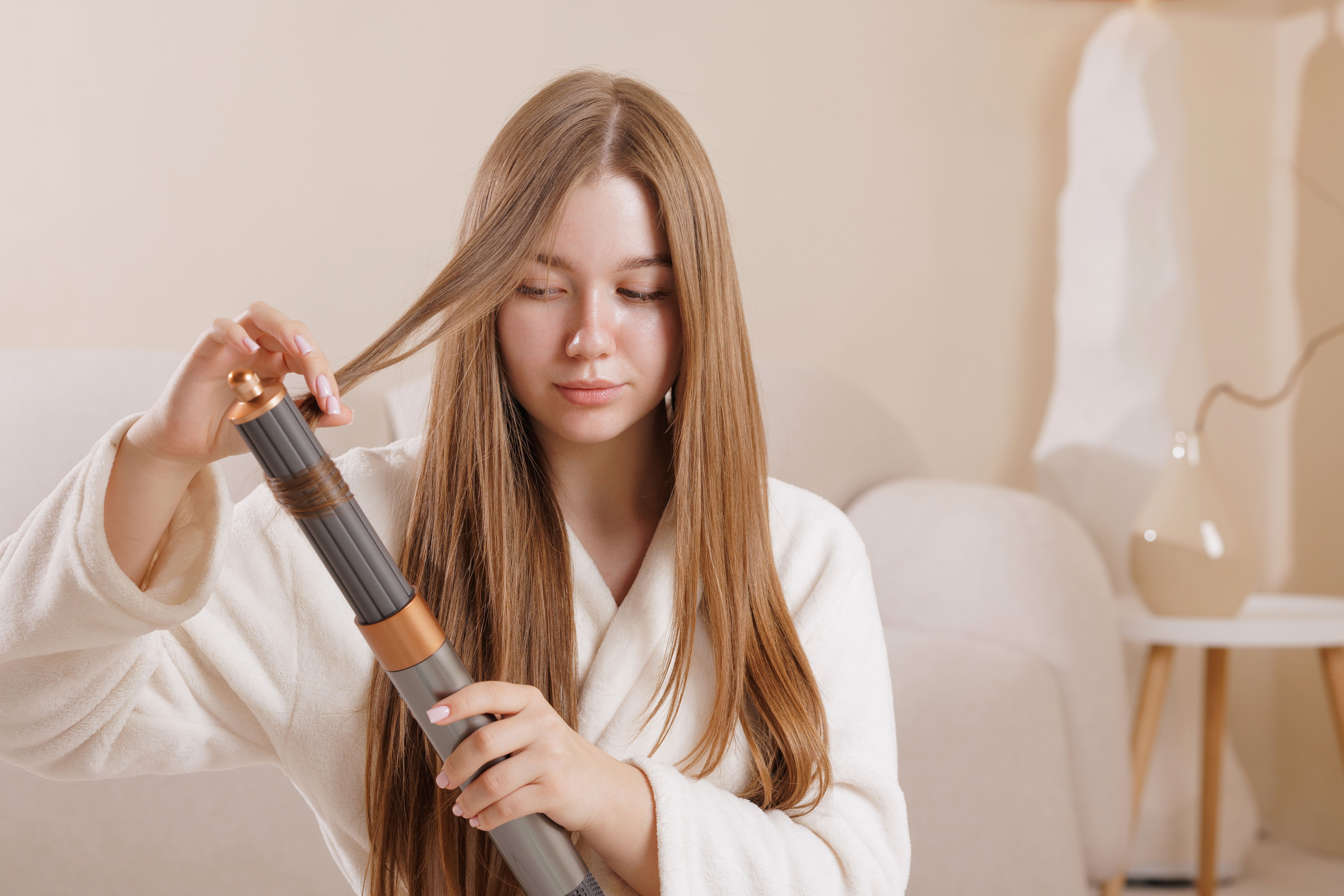 woman curling hair
