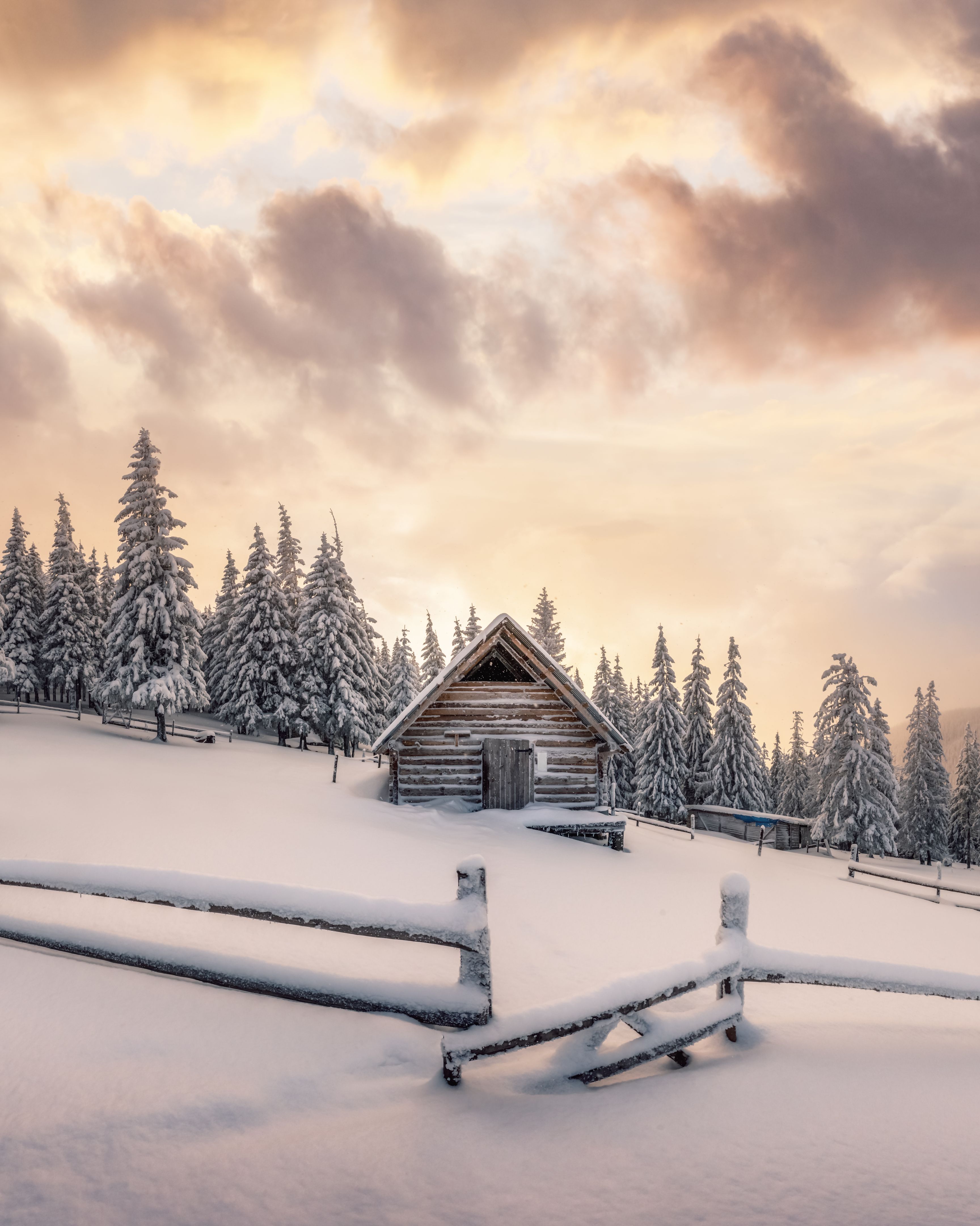 Fantastic landscape with snowy house