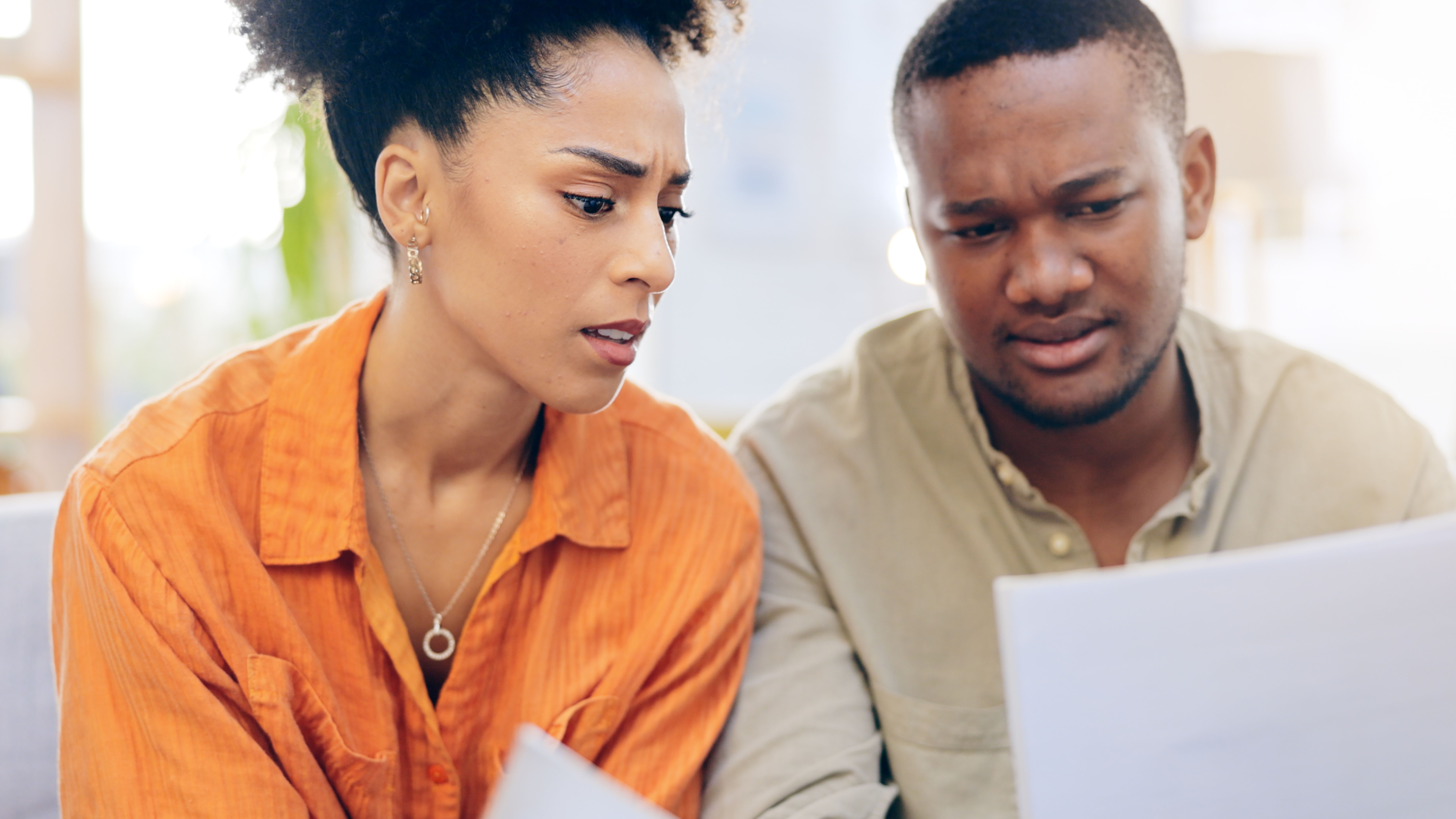 Couple, stress with finance paperwork and bills, bankruptcy and budget fail, insurance policy and inflation. Tax audit, financial crisis and debt, people at home with legal documents and mortgage