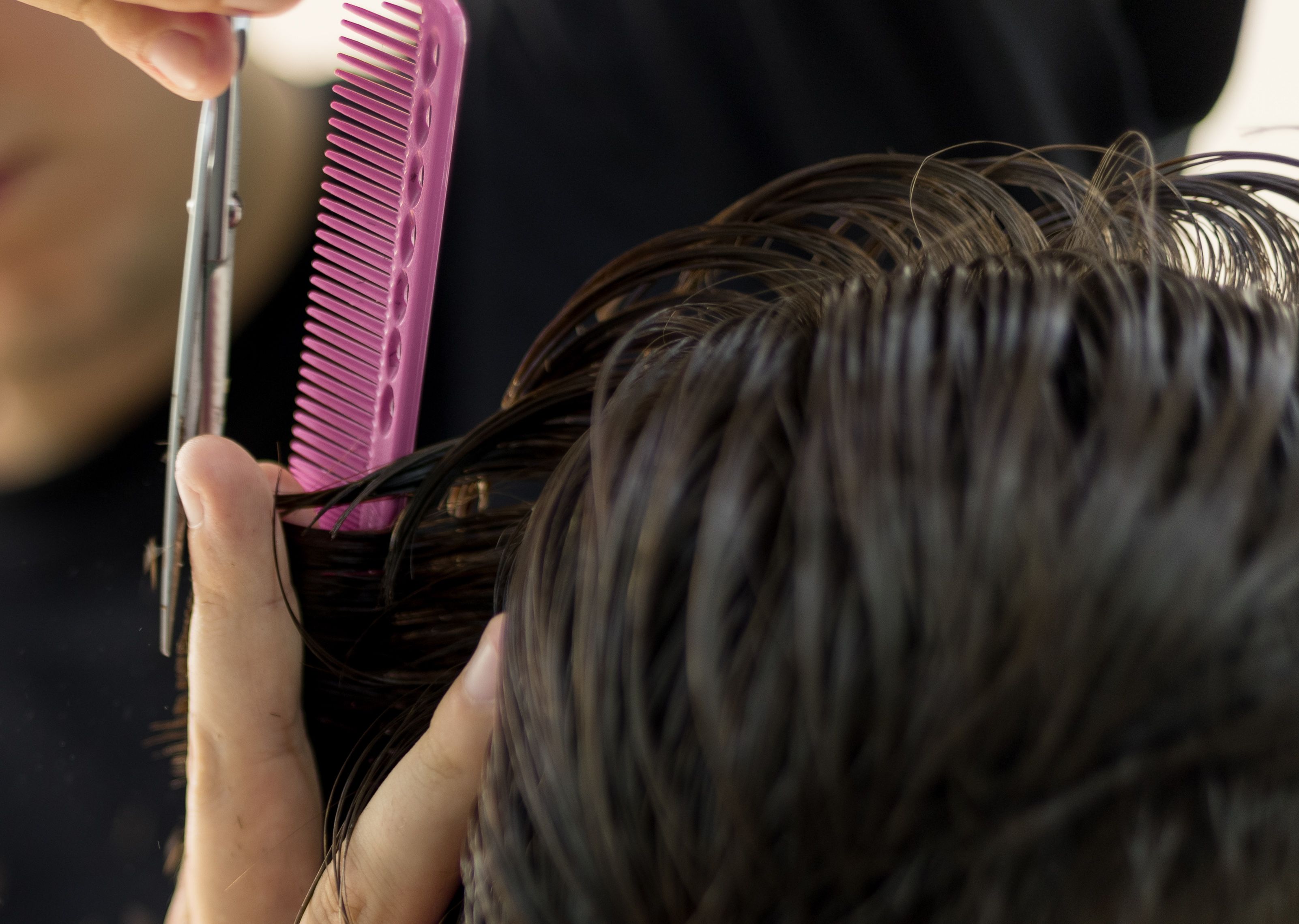 hair stylist working