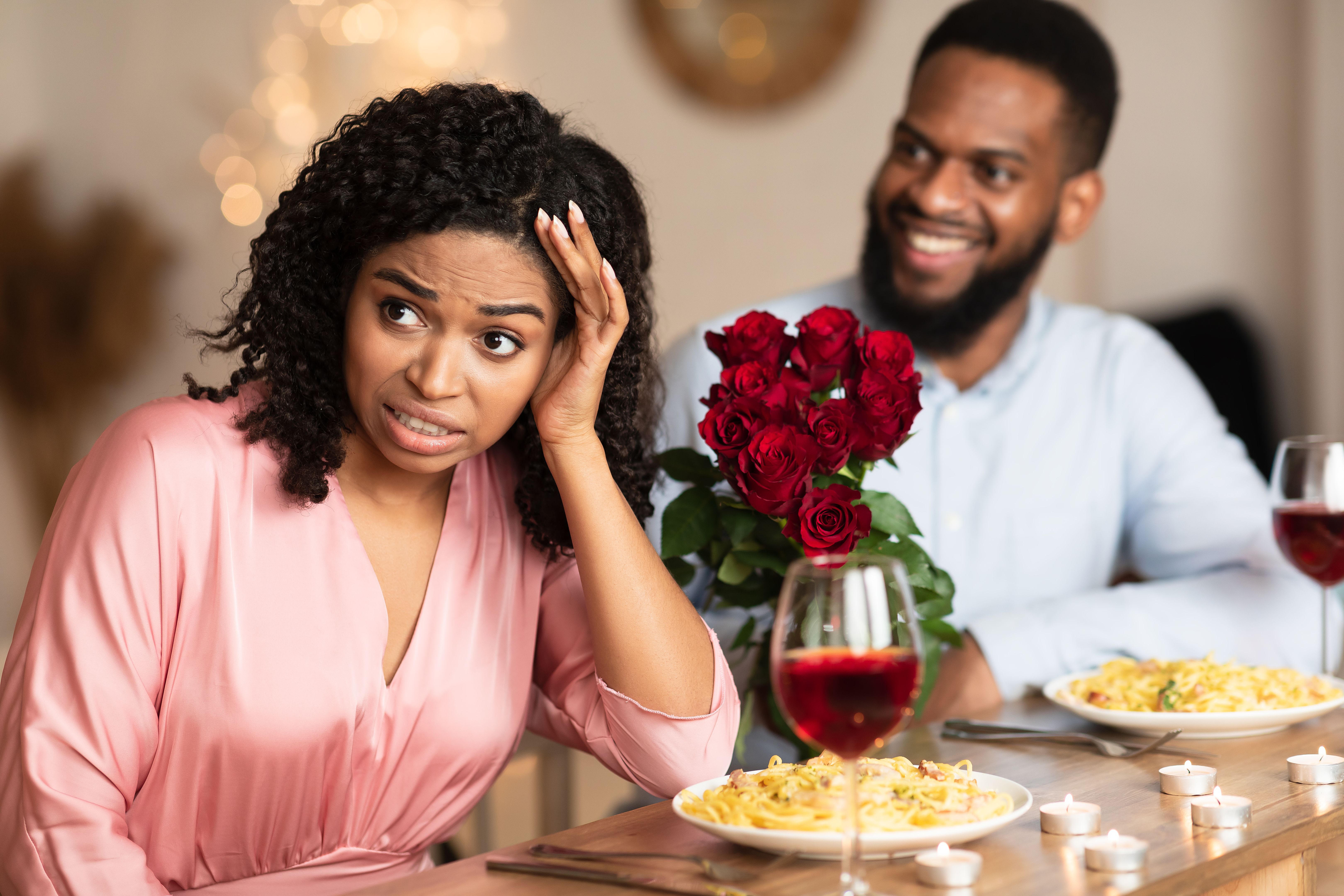 Black Woman On Unsuccessful First Date In Restaurant Black Woman On Unsuccessful First Date In Restaurant