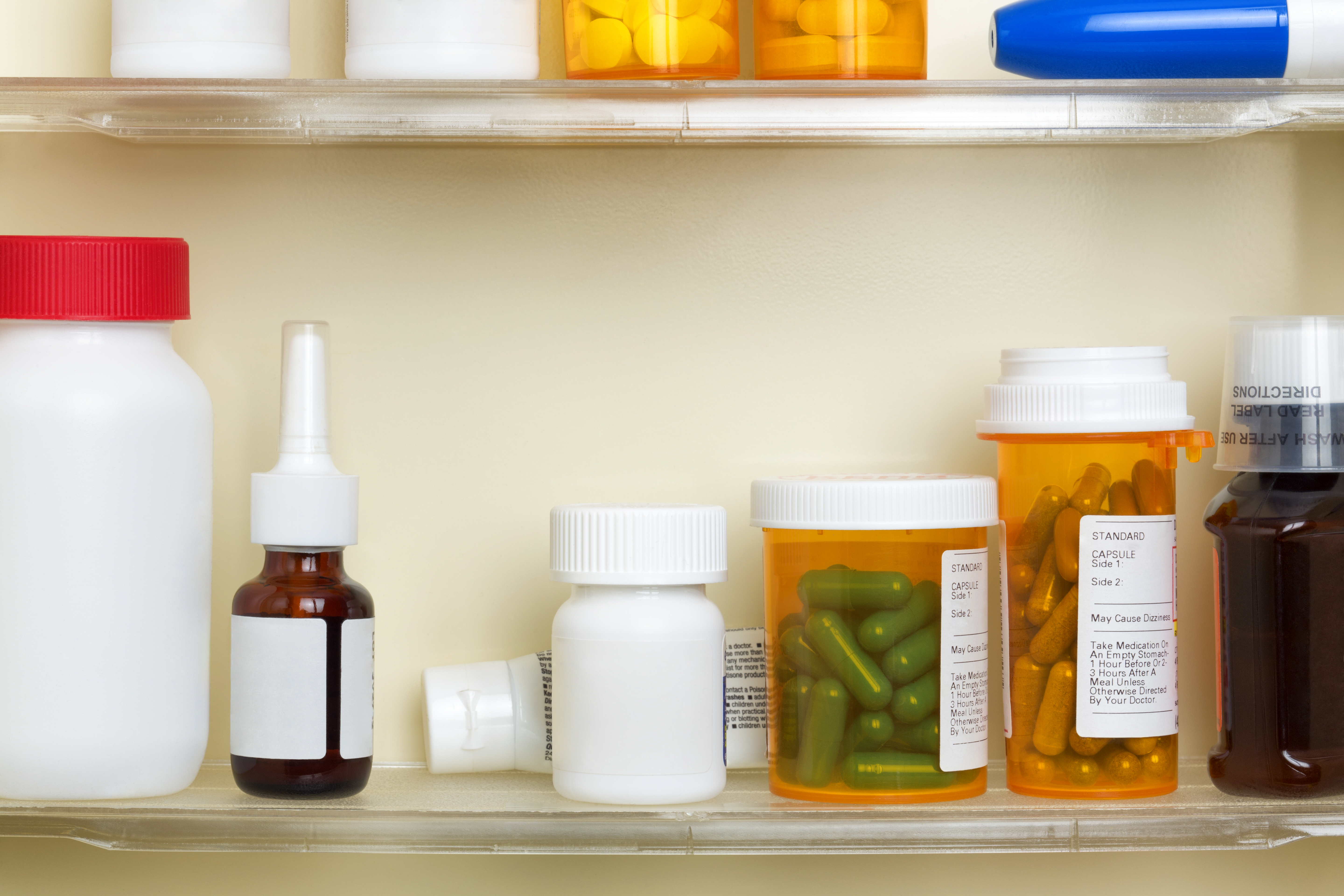 Medications on the Shelves of a Medicine Cabinet Medications on the Shelves of a Medicine Cabinet