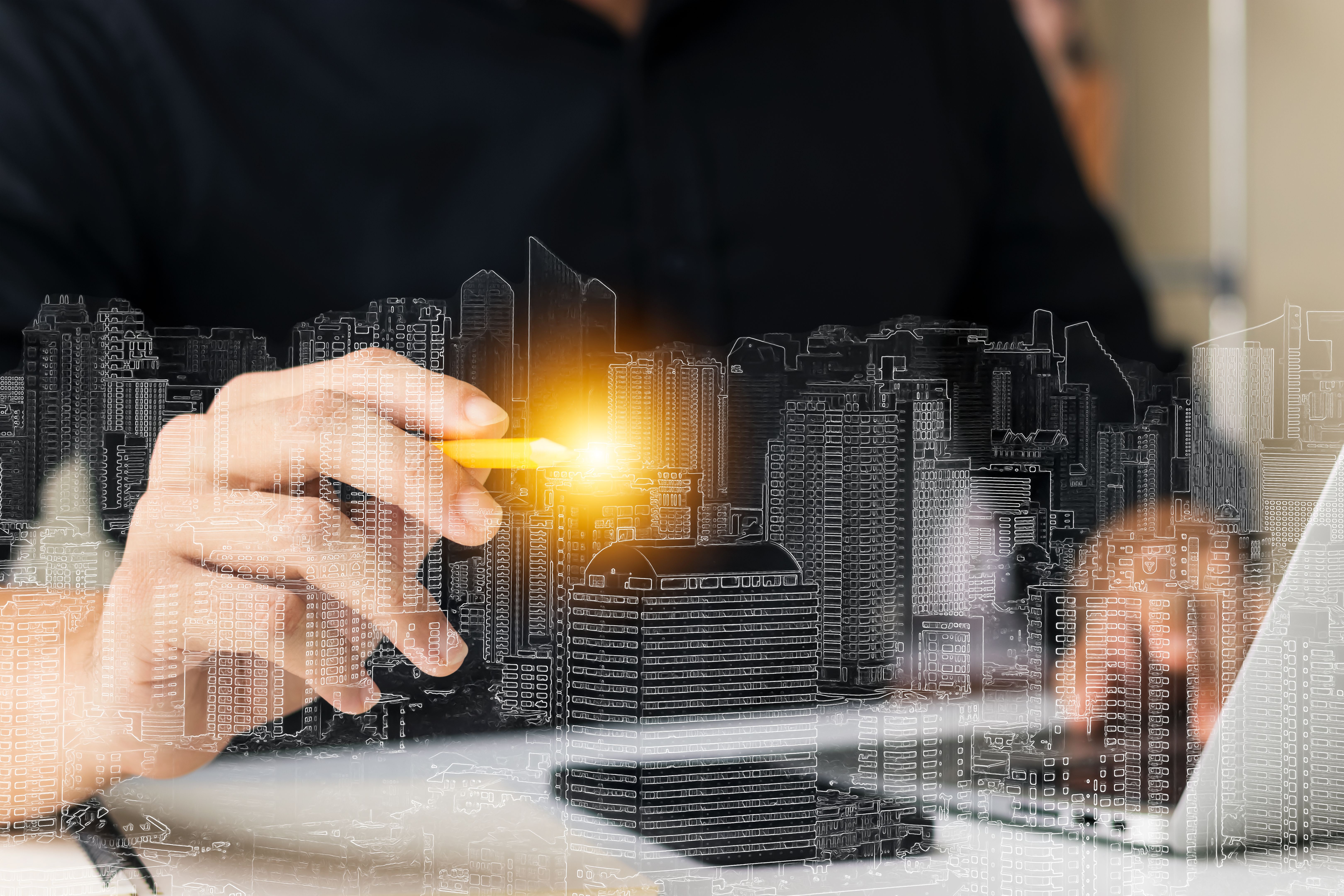 Architectural engineering concepts with engineers and architects, planning the buried city of the future using laptop computers, calculating building structures using modern technology.