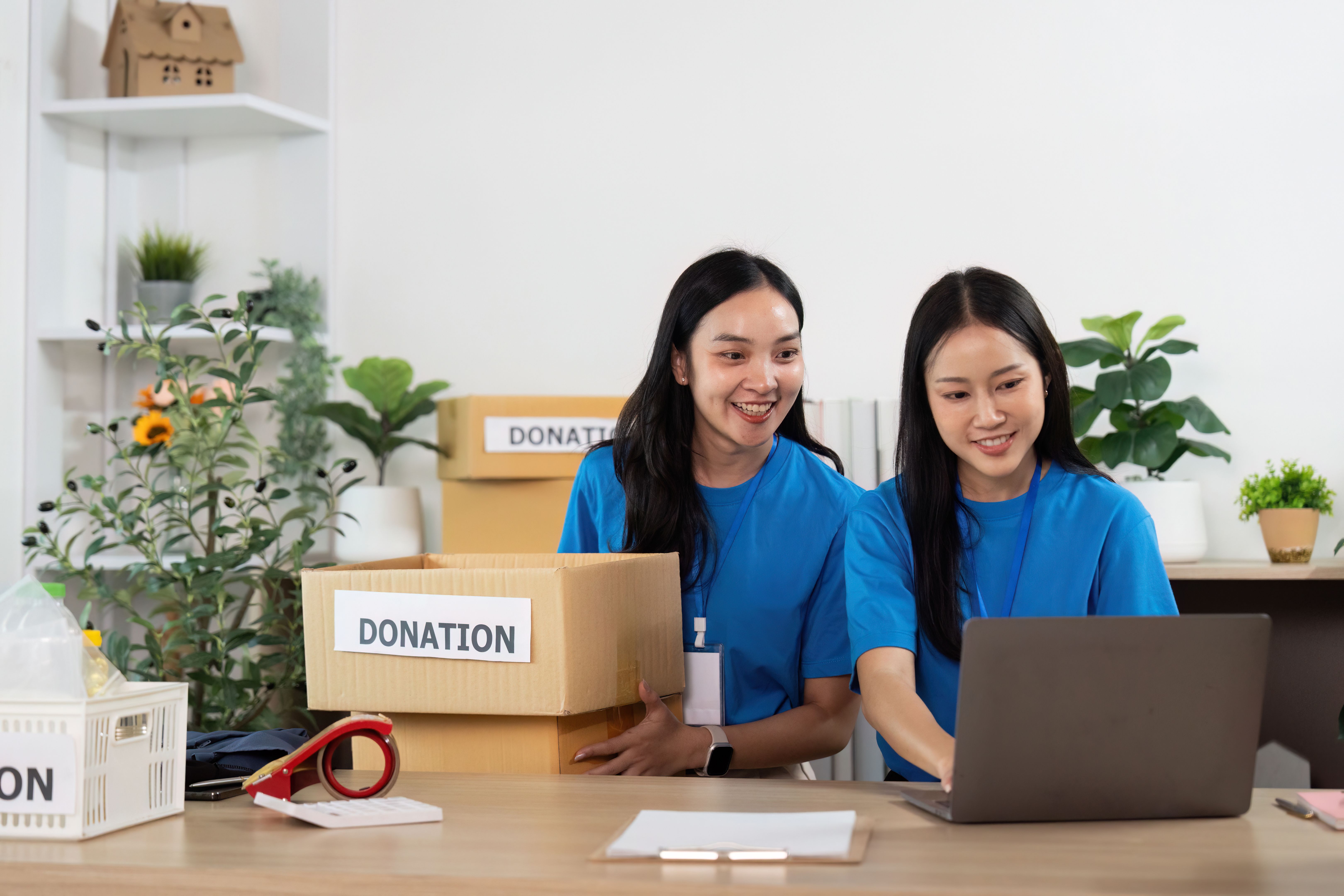 Volunteers Collaborating on Donation Projects with Enthusiasm