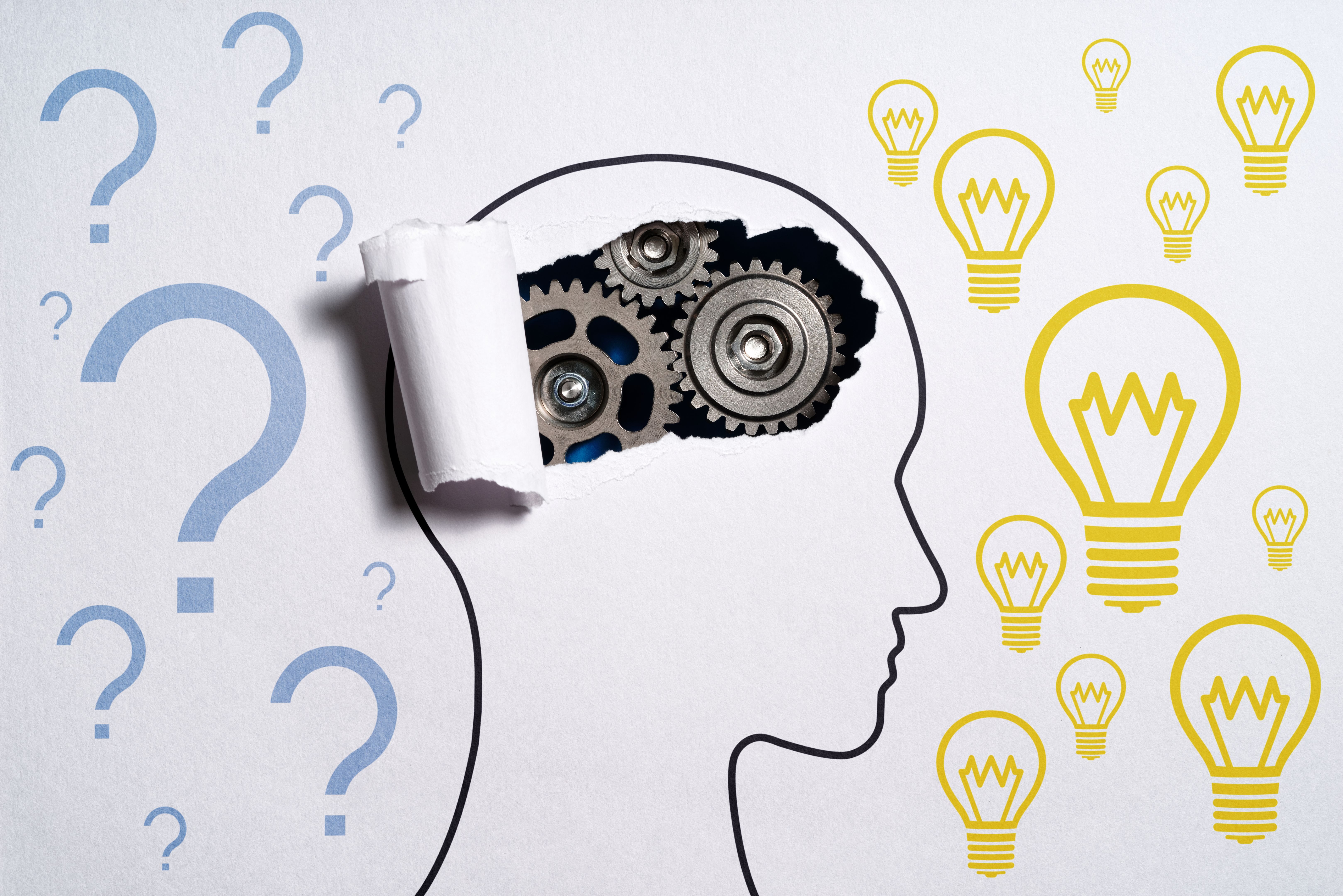 Thinking about questions and getting ideas. Human head silhouette and gears. Thinking about questions and getting ideas. Human head silhouette and gears.