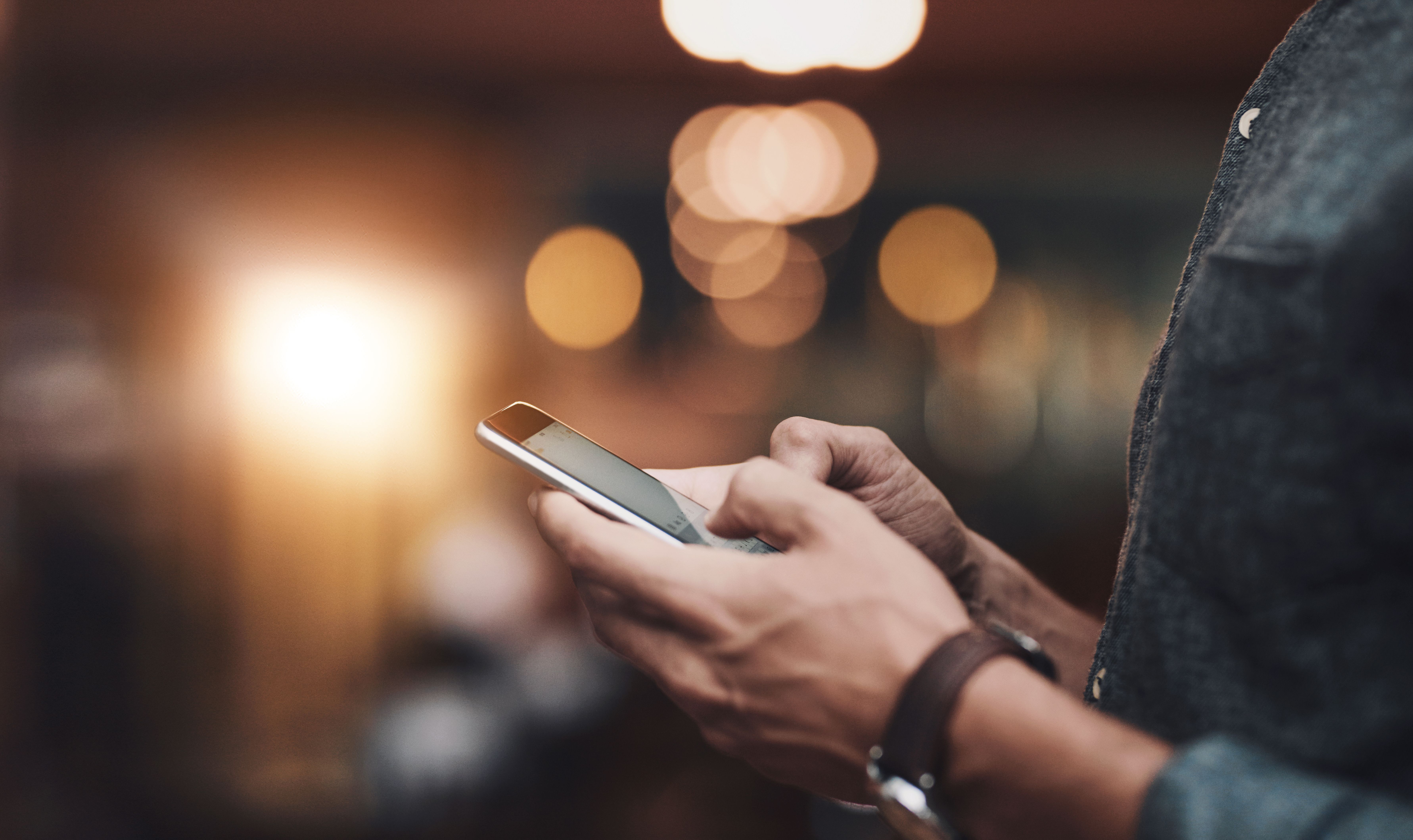 Man, typing hands and phone internet for social media, email notification and connection for search. Male person, fingers and mobile for chat app, message and online invitation for restaurant launch