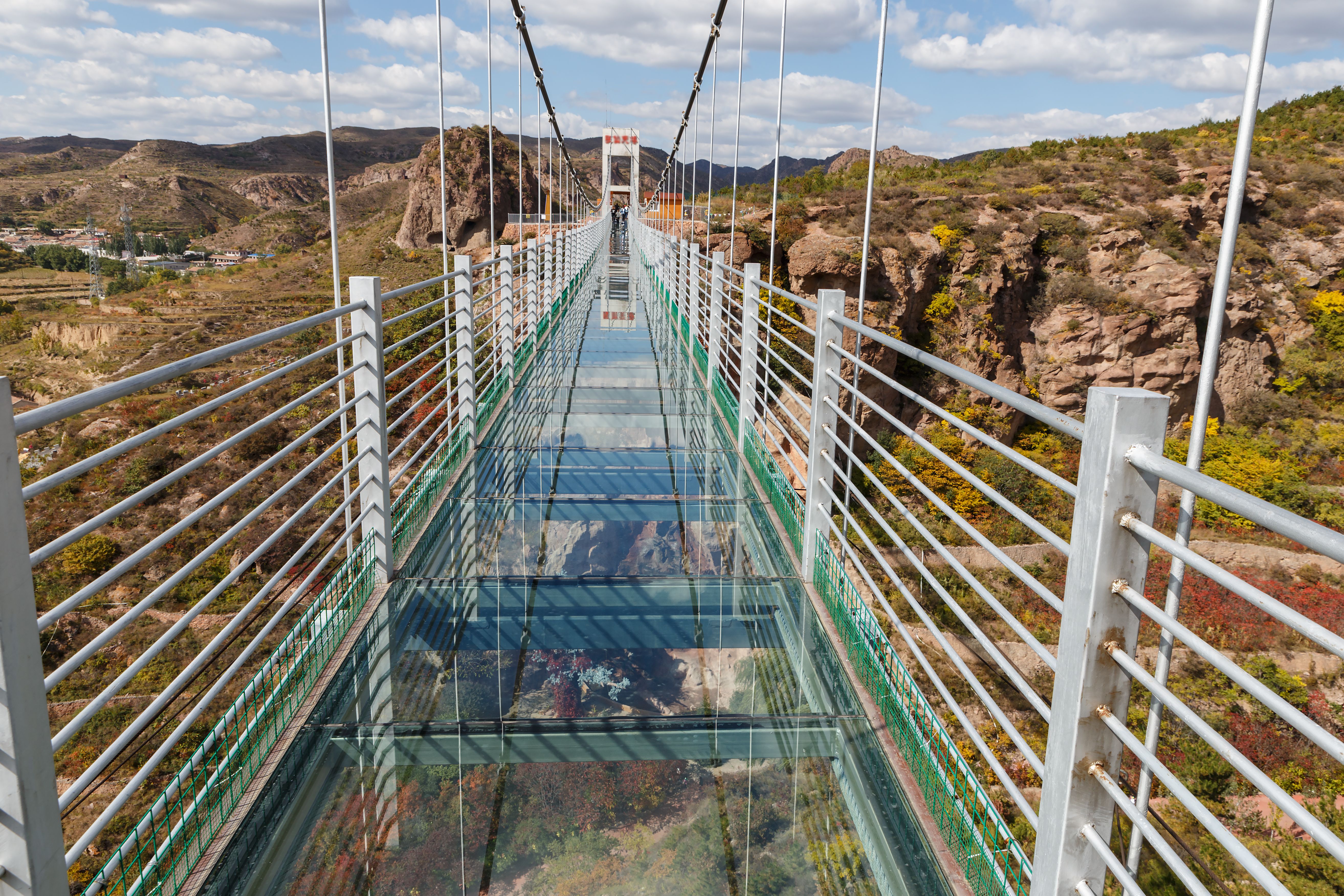 glass suspension bridge in the mountains