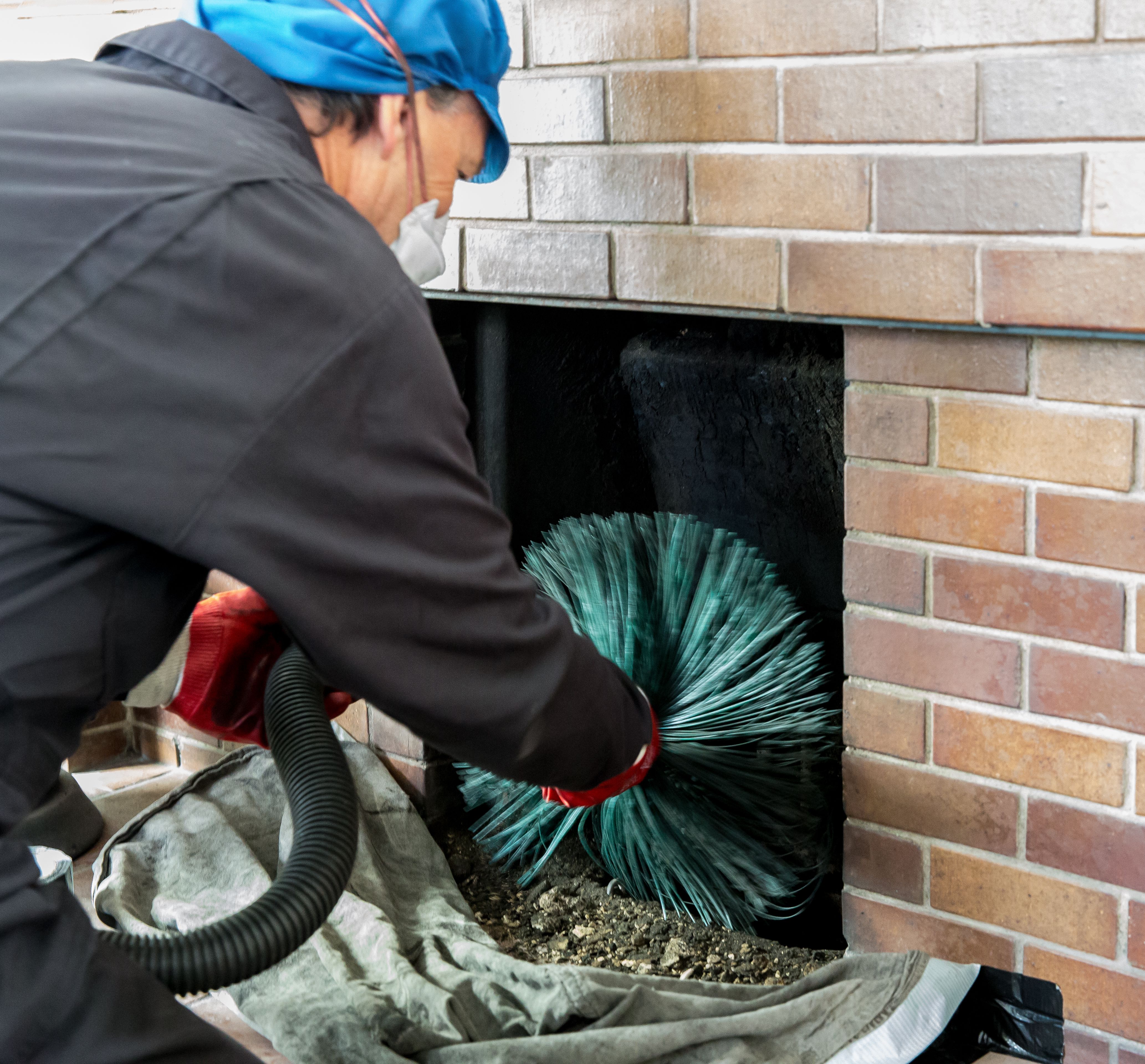 Chimney sweep servicing a Rockville MD chimney