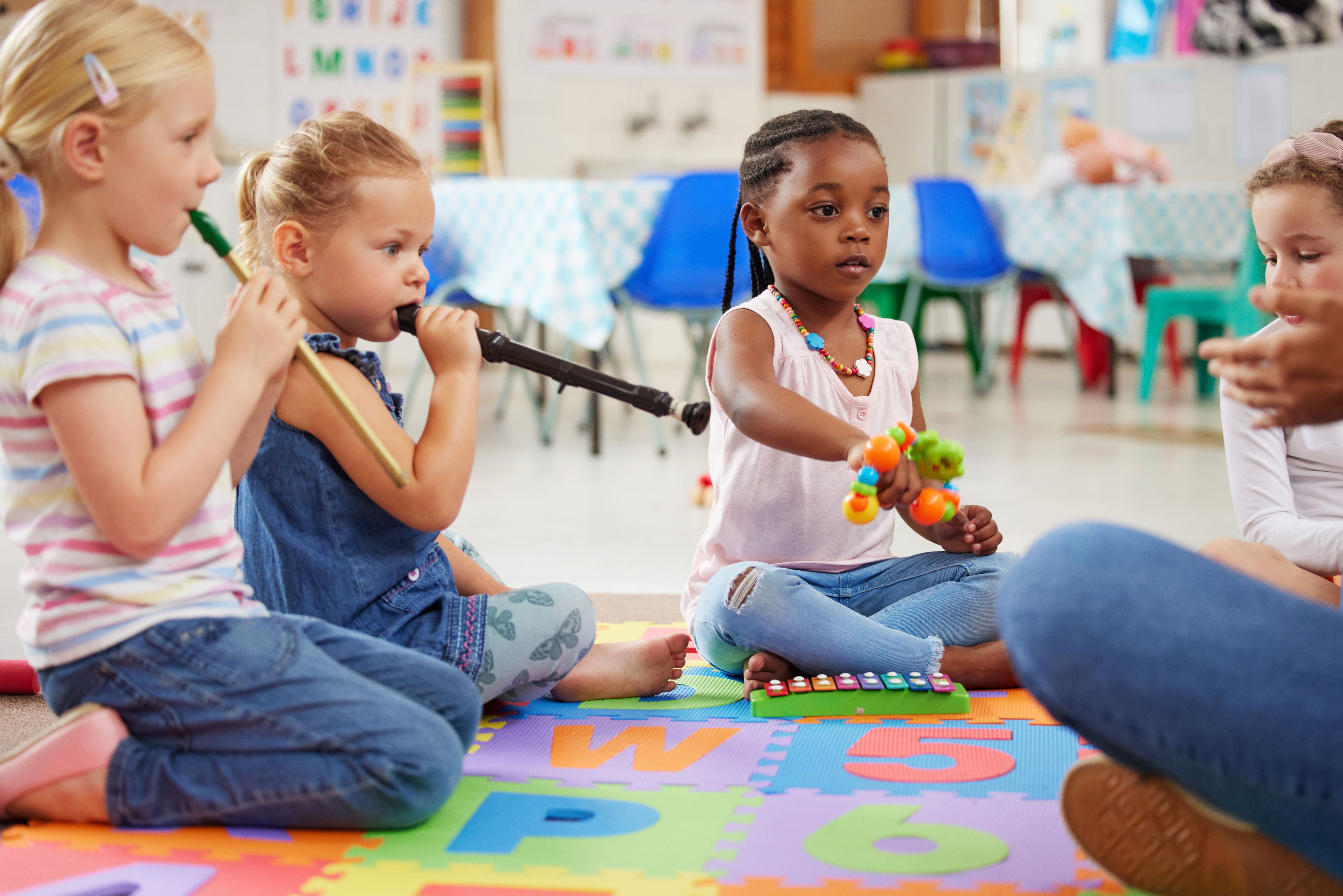 children playing music