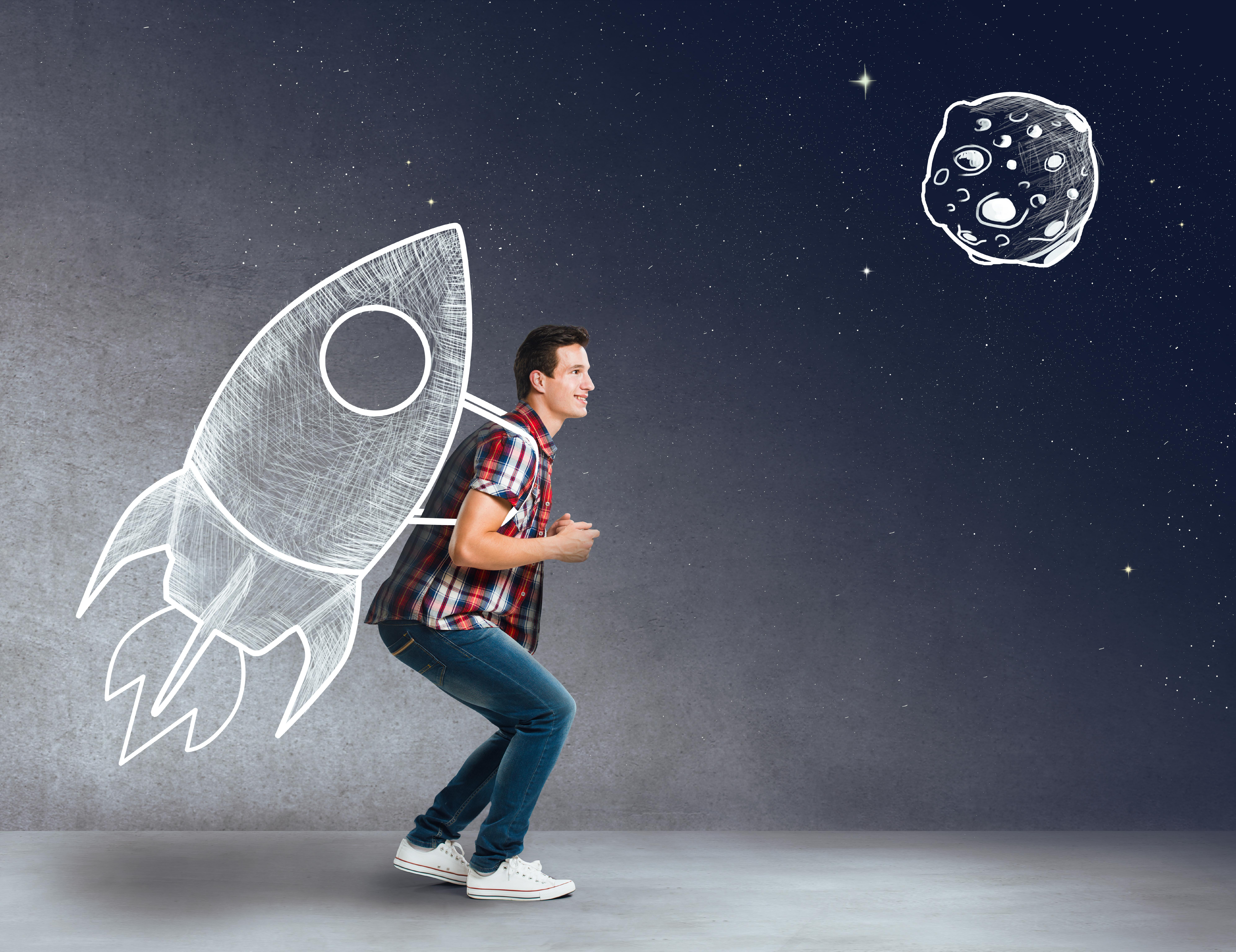 Young man with a rocket on his back Young man with a rocket on his back