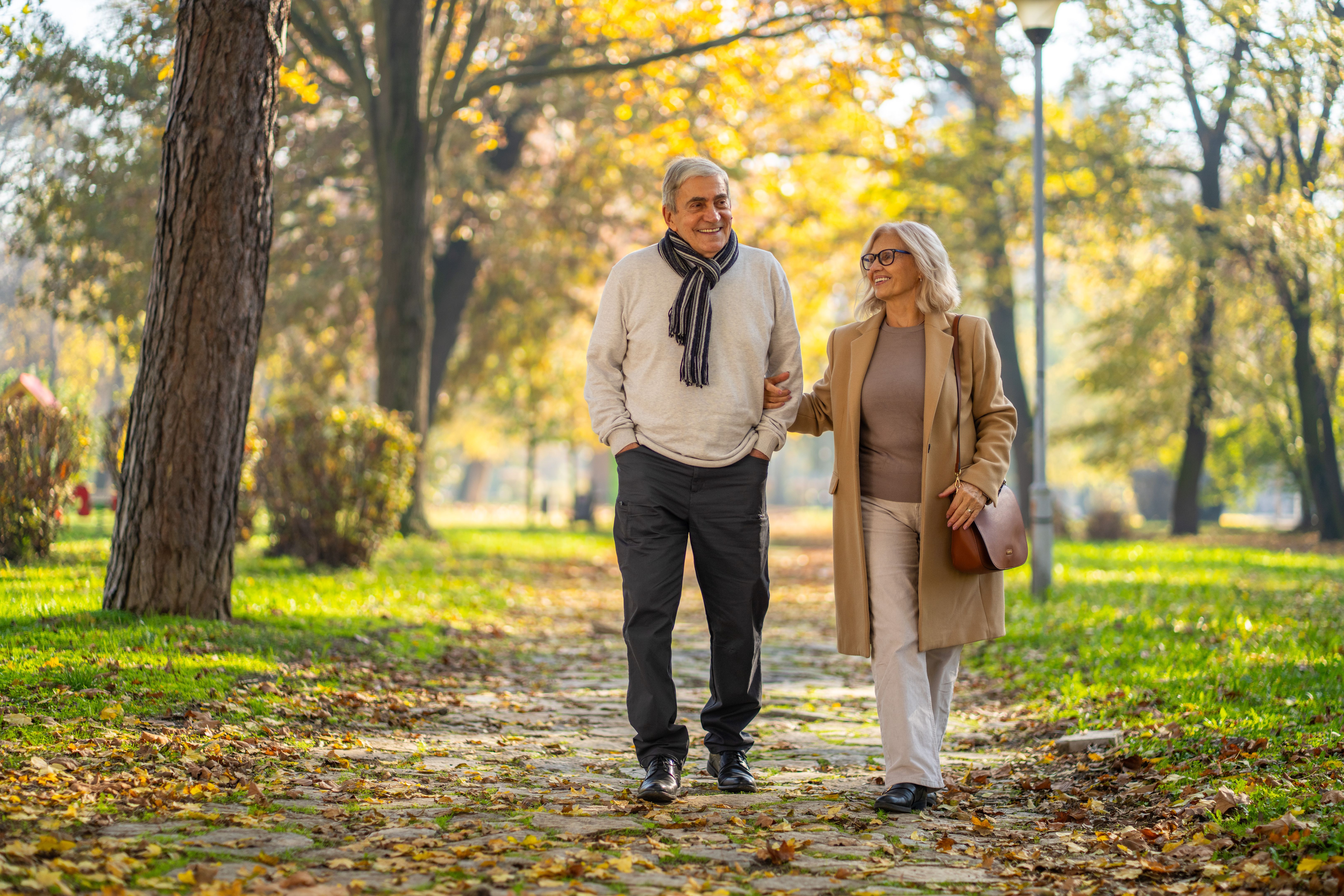 couple walking autumn