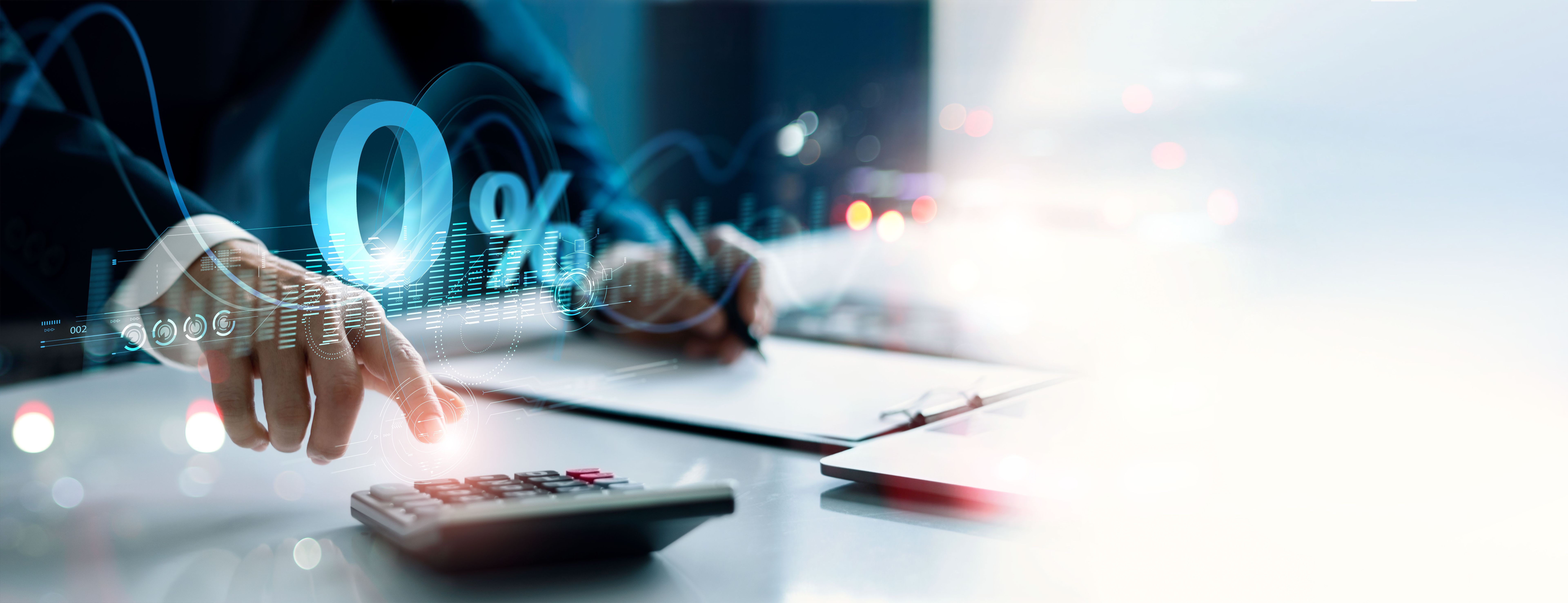 Businessman using a calculator to calculate the numbers with Zero percent sign. Zero percent commission.  Economic recession. Interest rate burden. Payment. Discount and no commission.