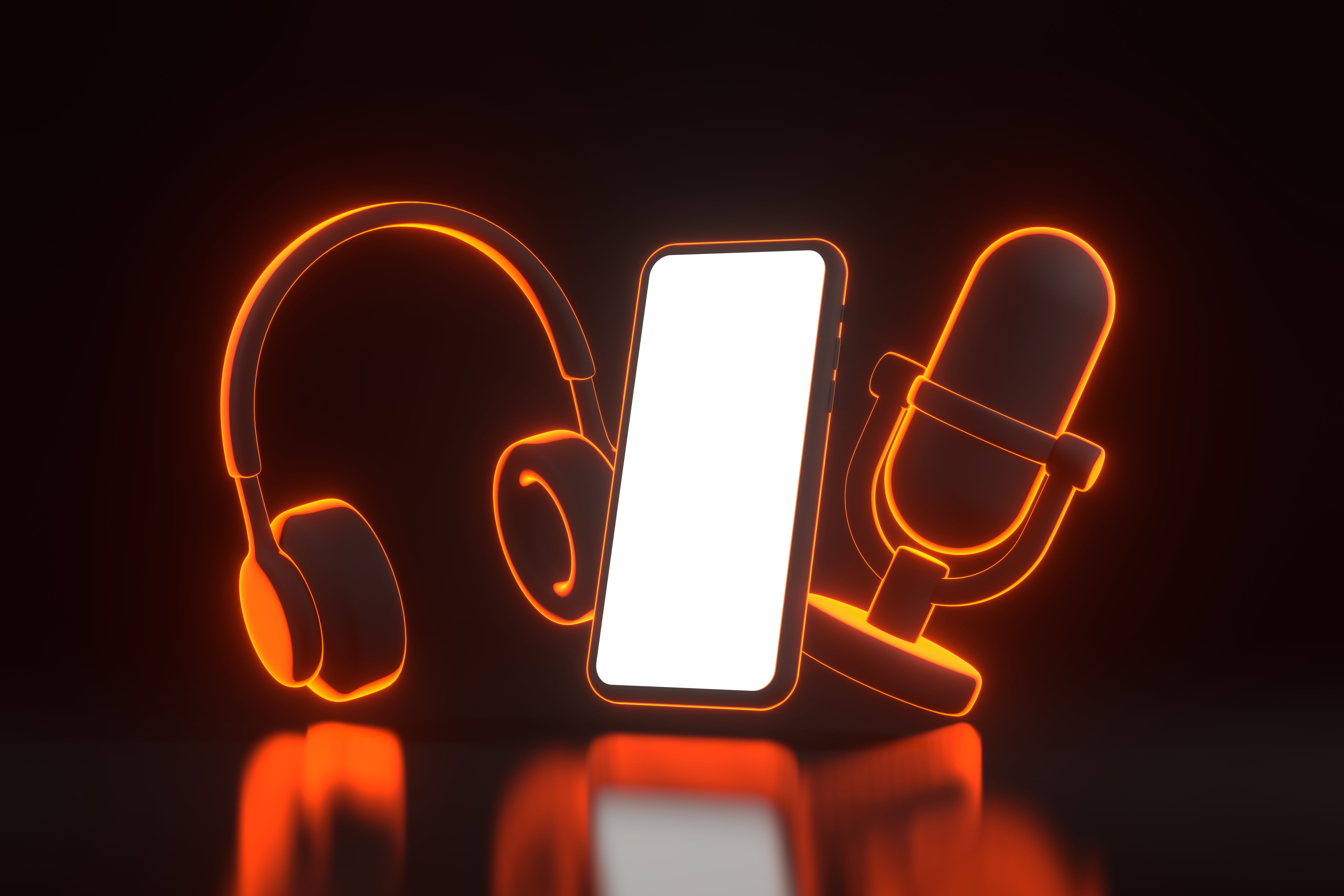 Microphone, headphones and smartphone with bright glowing futuristic orange neon lights on black background