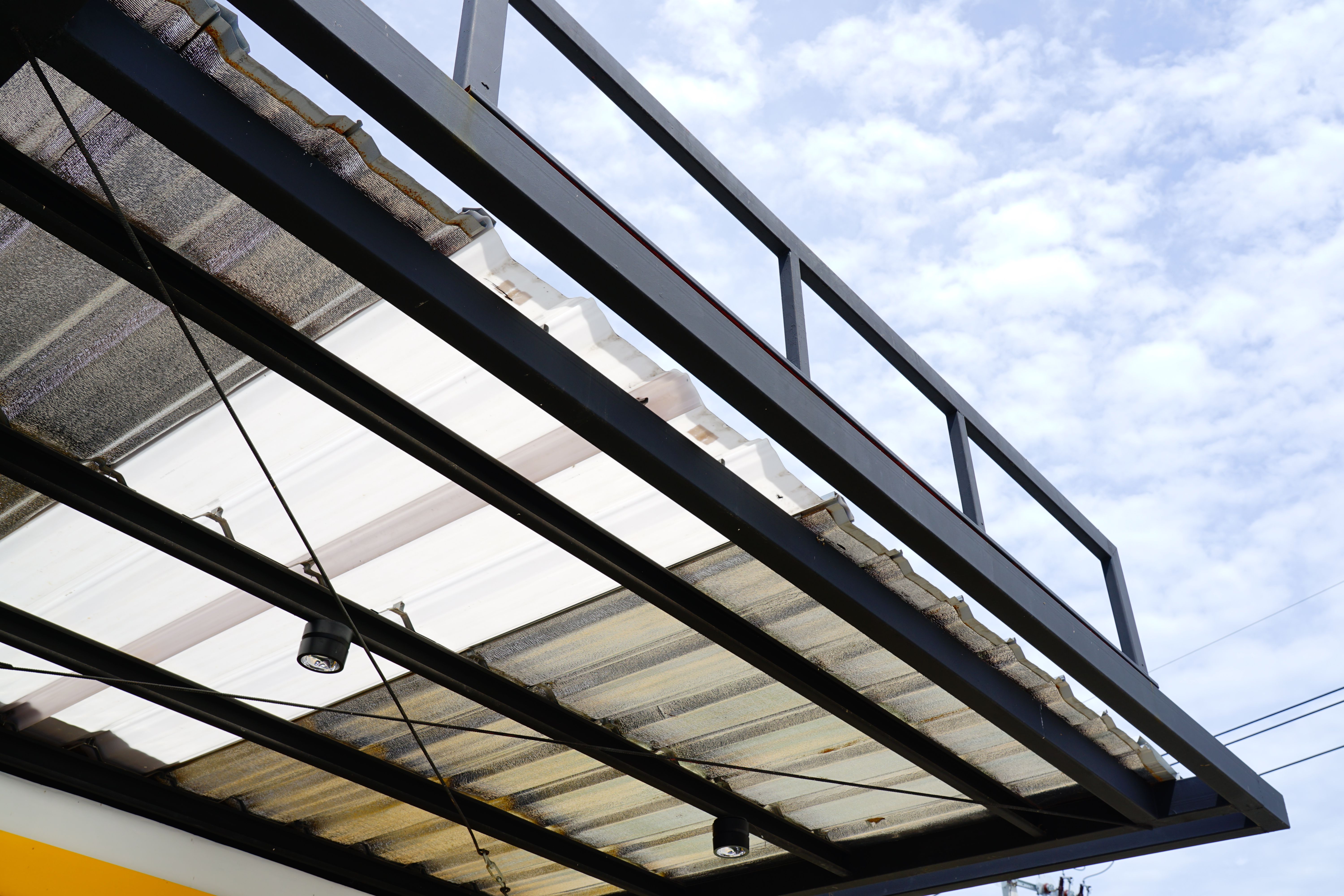 Polycarbonate or transparent roof with black steel structure