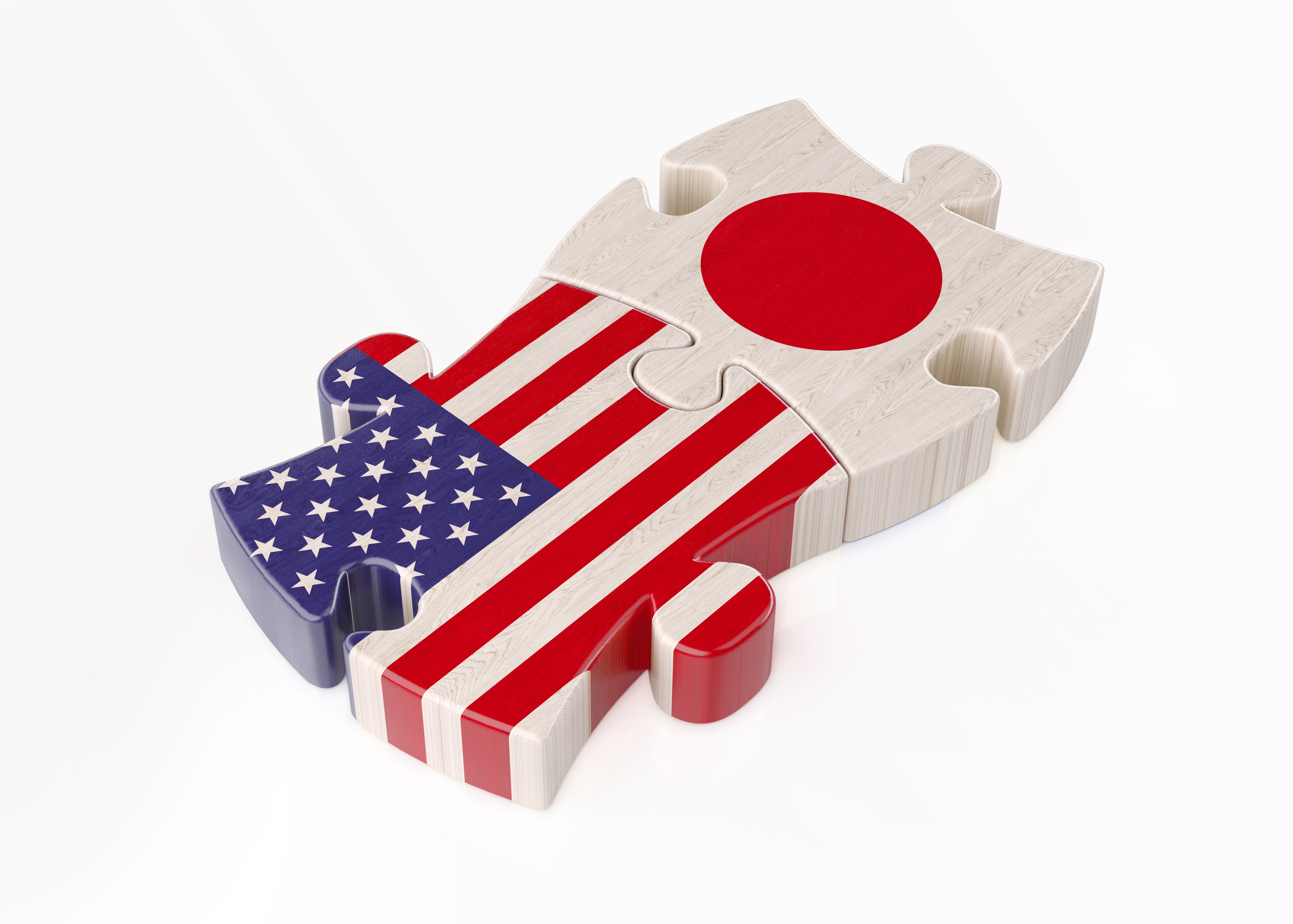 Wood Jigsaw Puzzles Textured with USA and Japanese Flags ; Teamwork Concept