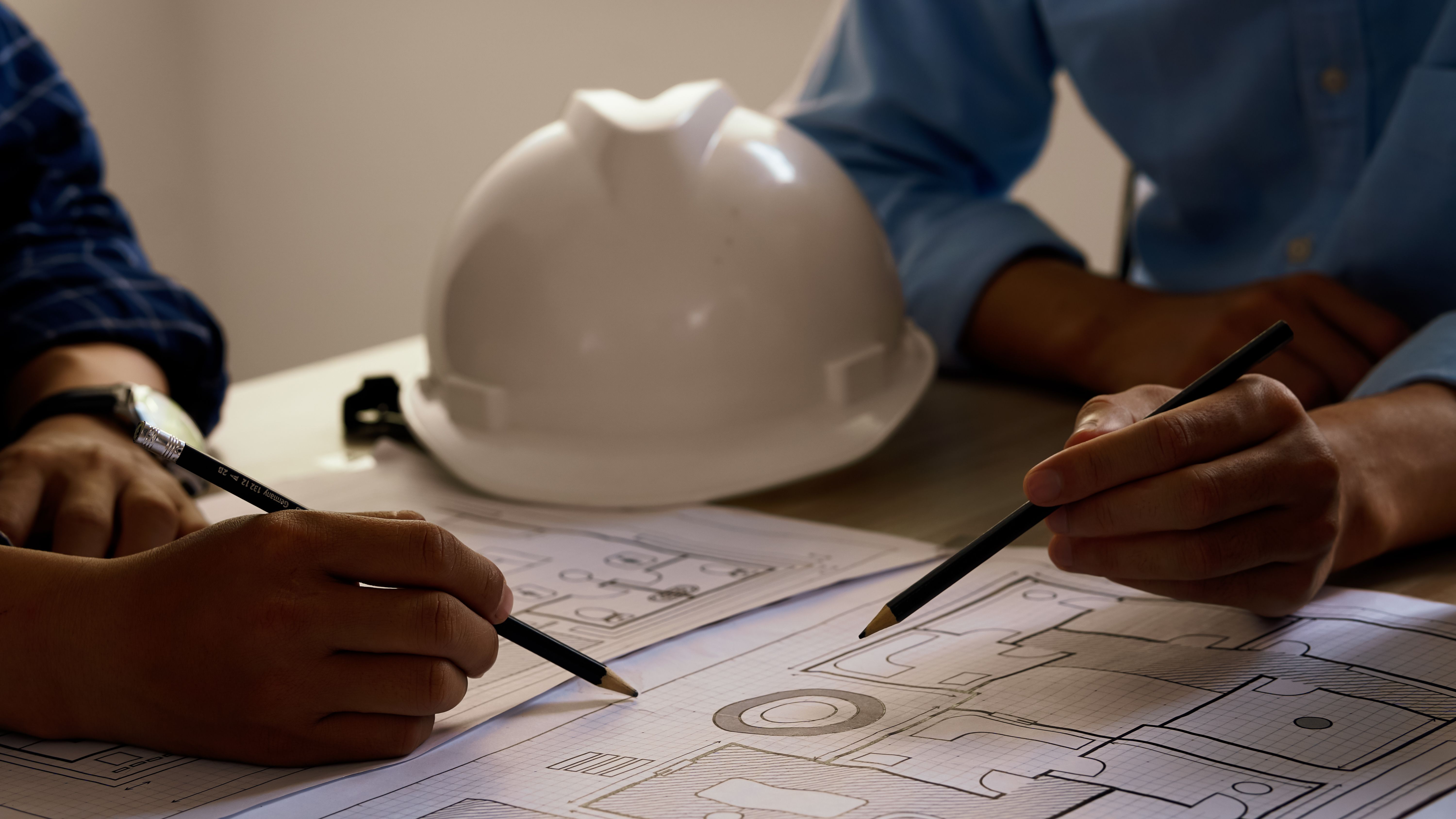 Engineer teams meeting working together. Architects concept, engineer architect designer freelance work on start-up project drawing, construction plan architect design working drawing sketch plans.