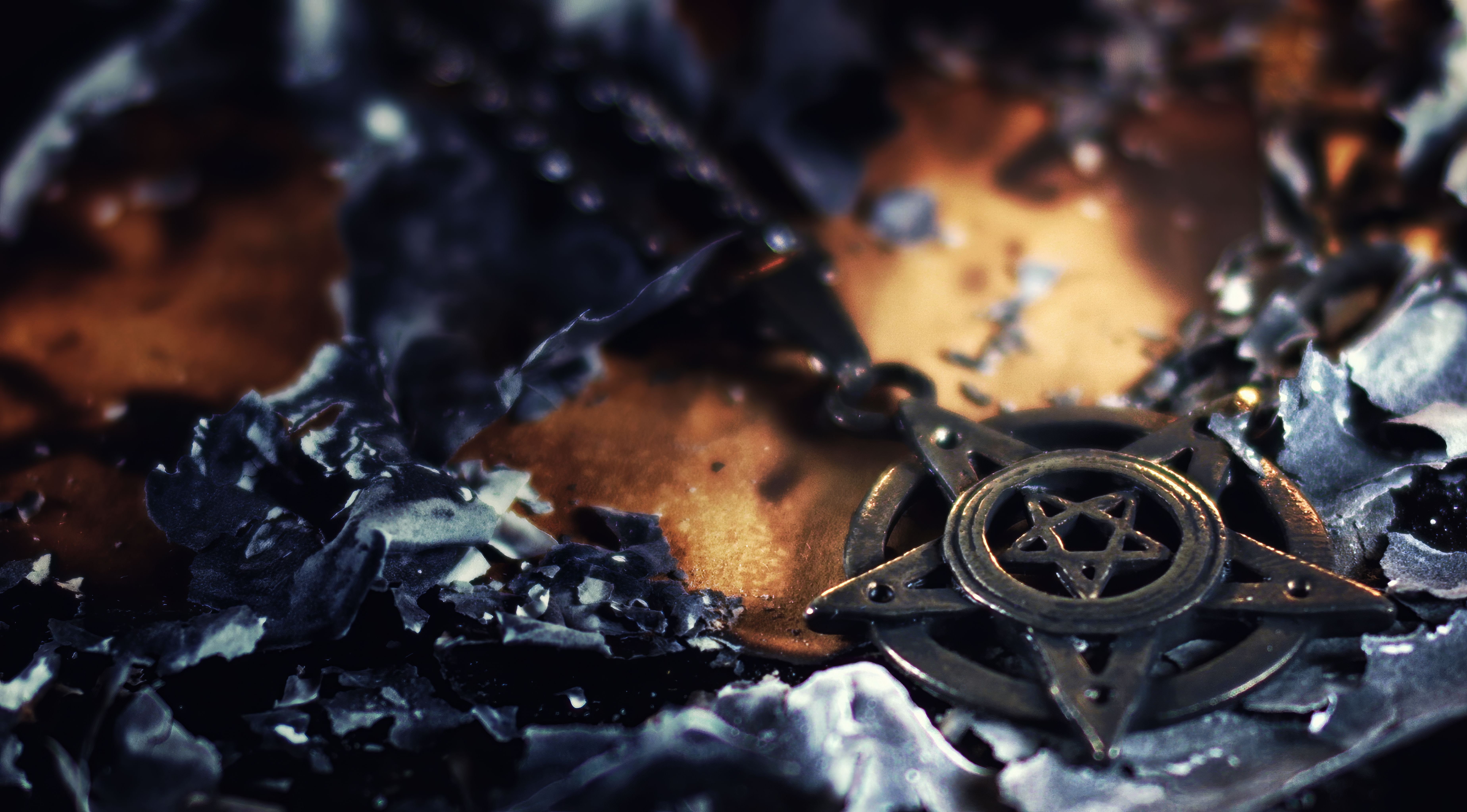 Magical Occult Symbol Pentagram in Fire and Ashes Magical Occult Symbol Pentagram in Fire and Ashes