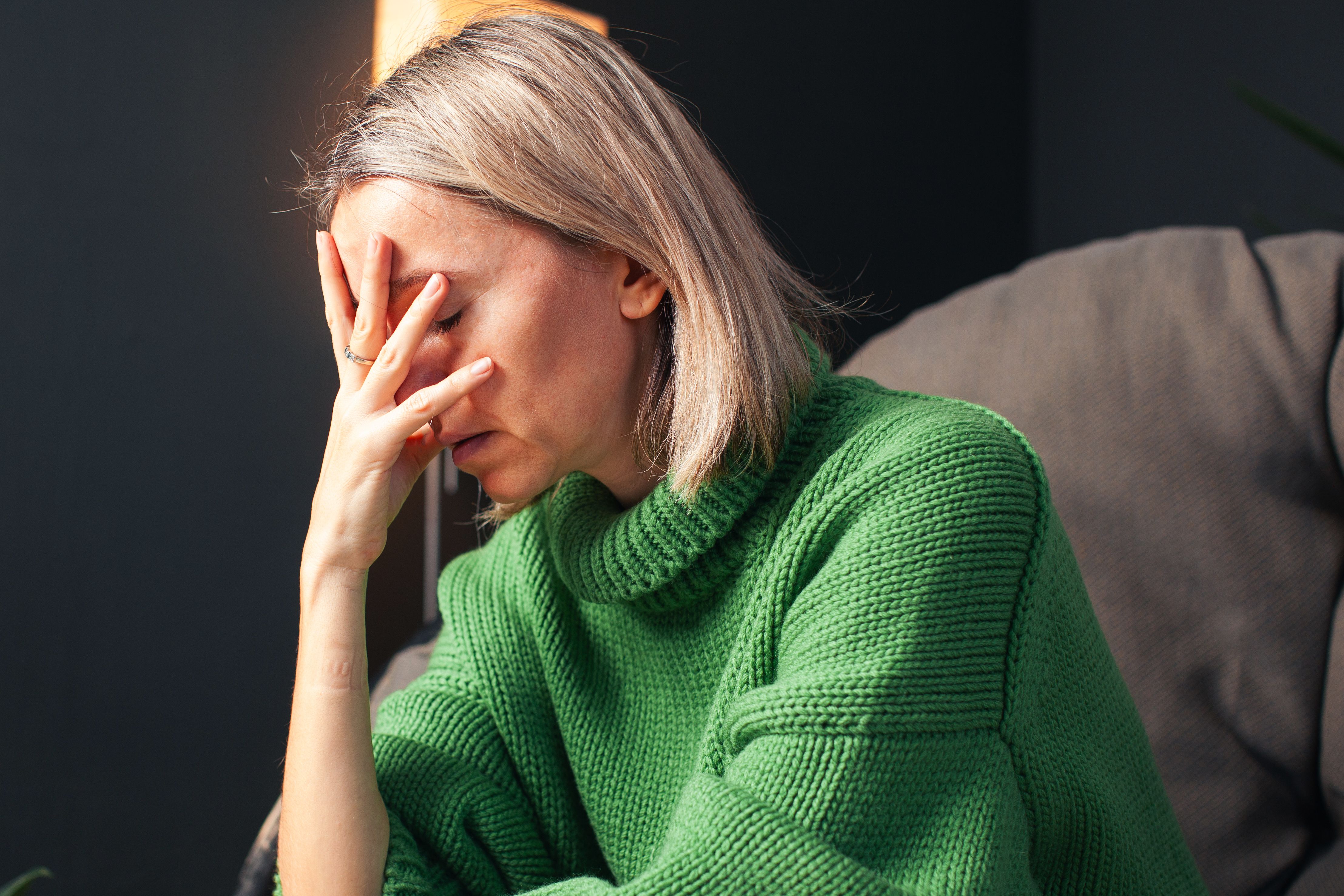 Middle age Sad Woman at Home