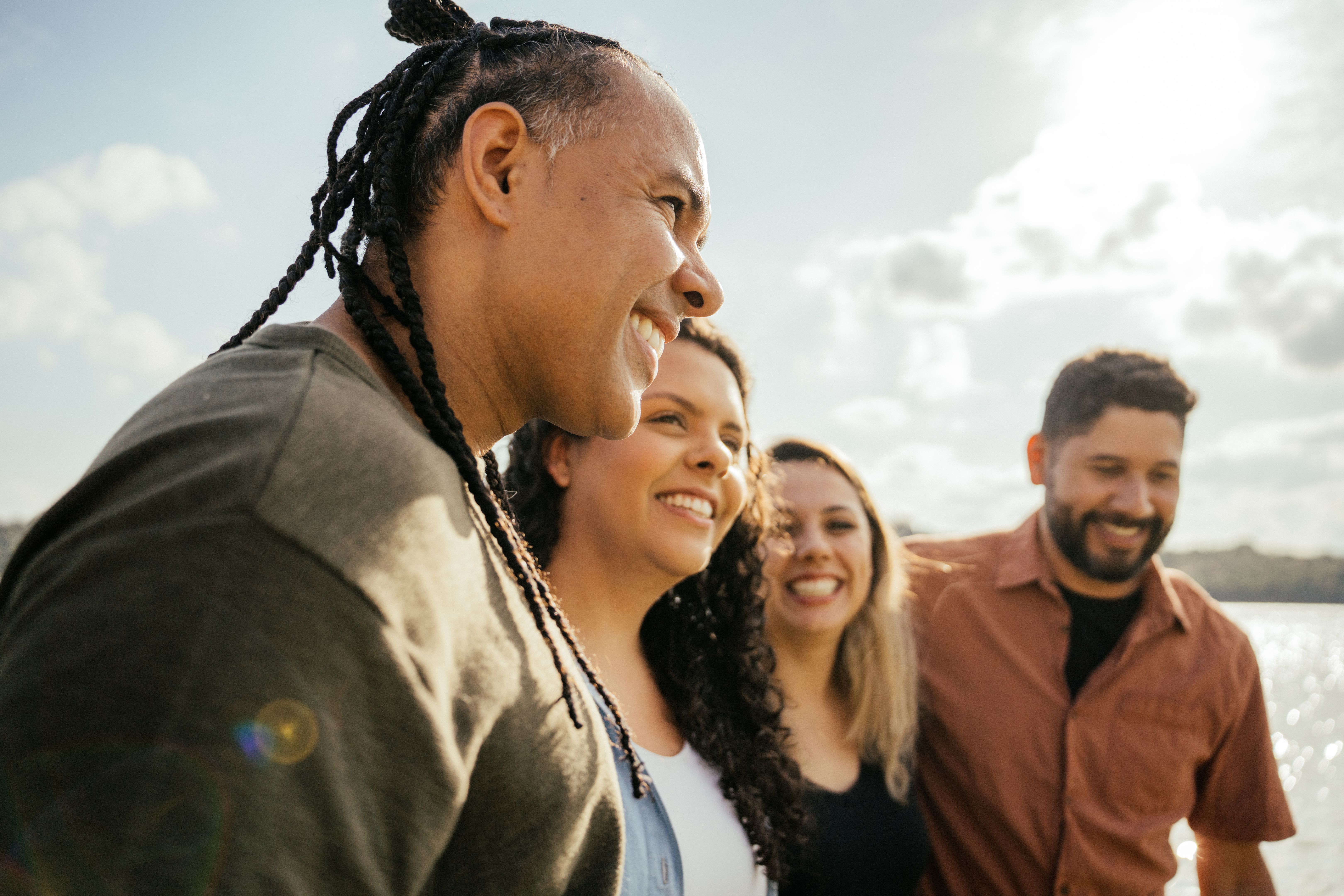 Friends hugging smiling