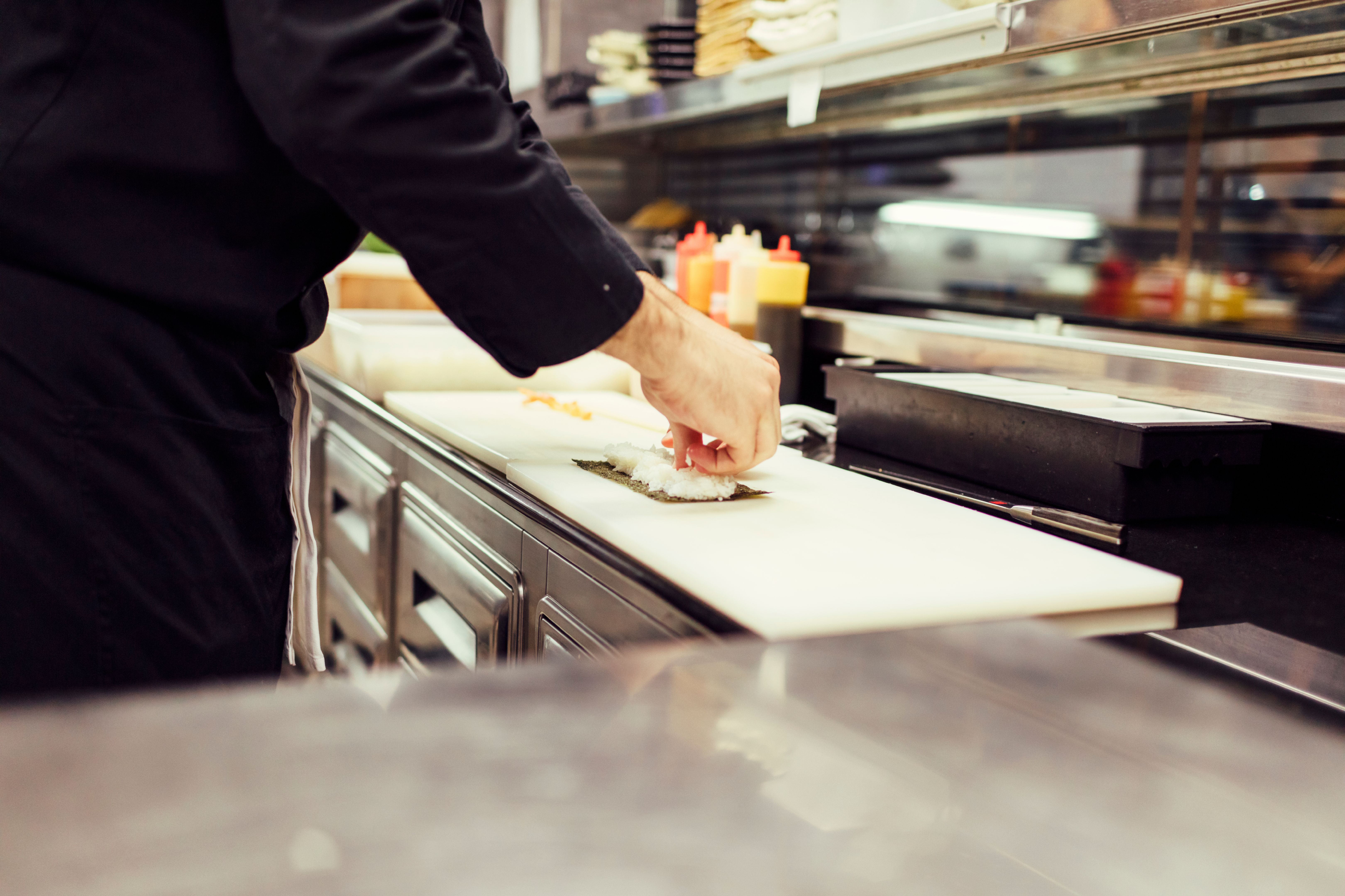 chef preparing sushi