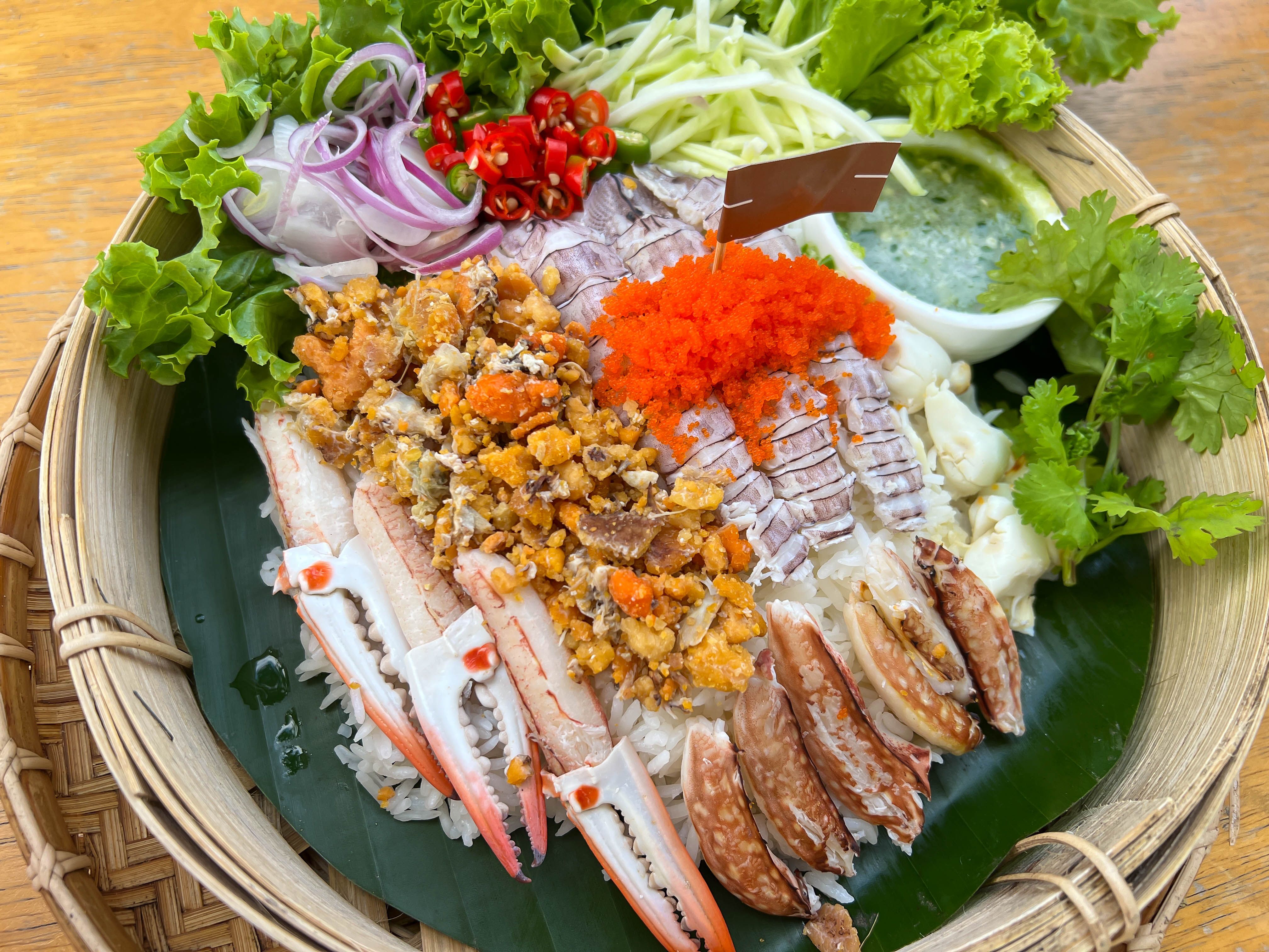 Rice with boiled crab meat and spicy seafood Rice with boiled crab meat and spicy seafood