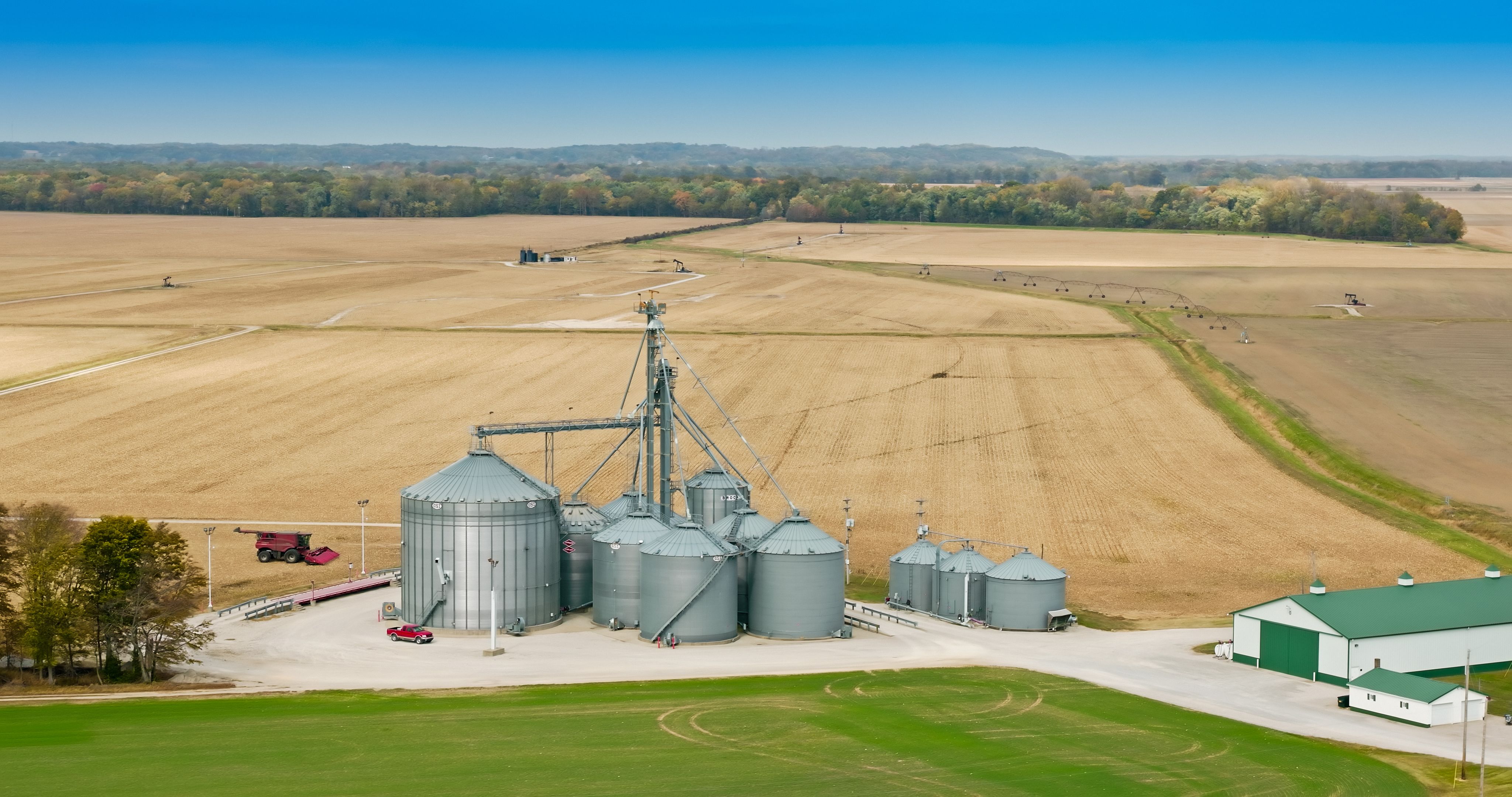 Grain Silos Surrounded by  Farmland  in Posey County, Indiana in Fall - Aerial