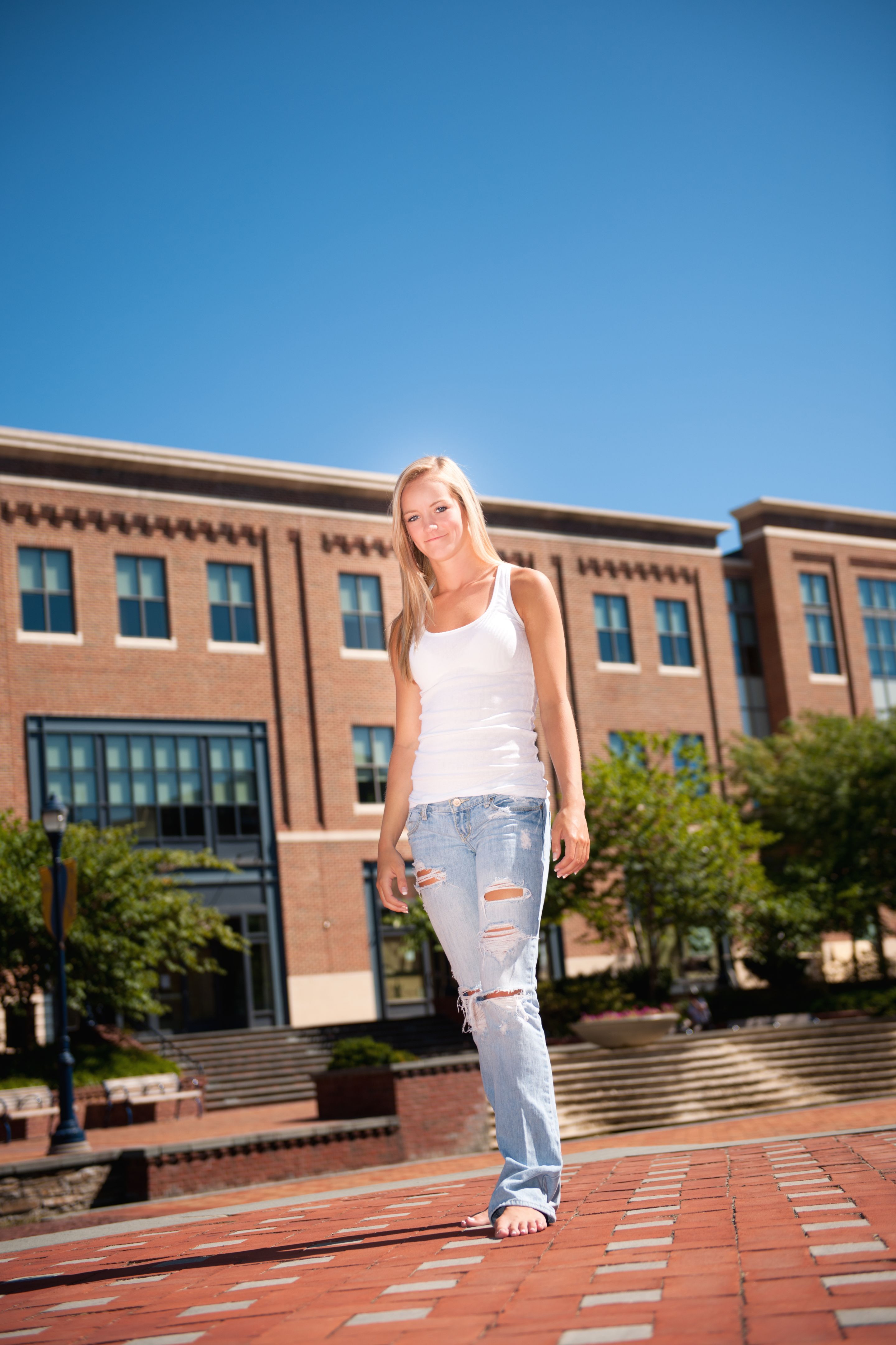 Young Woman Standing In Front Of Building Young Woman Standing In Front Of Building