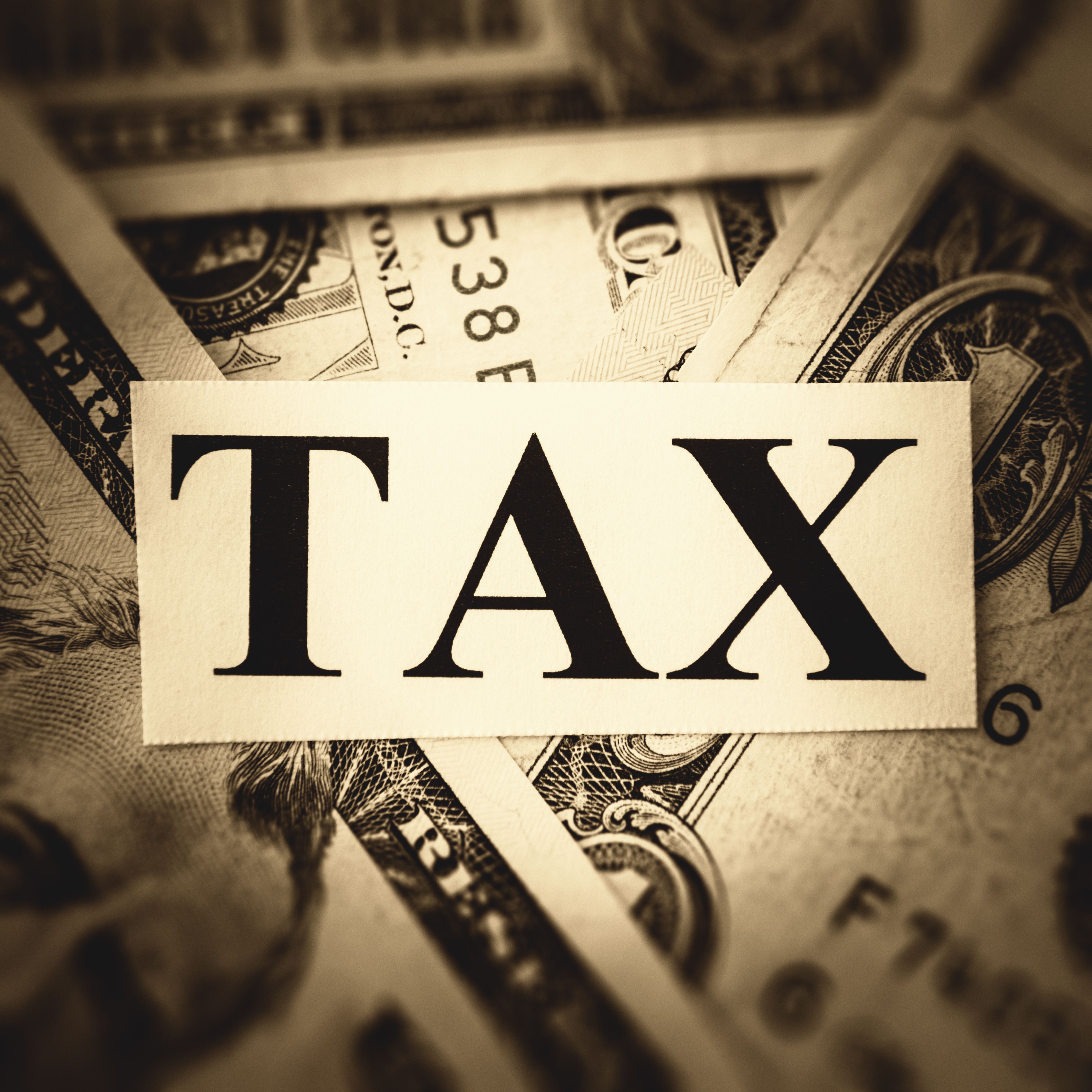 tax message on dollar banconotes tax message on dollar banconotes