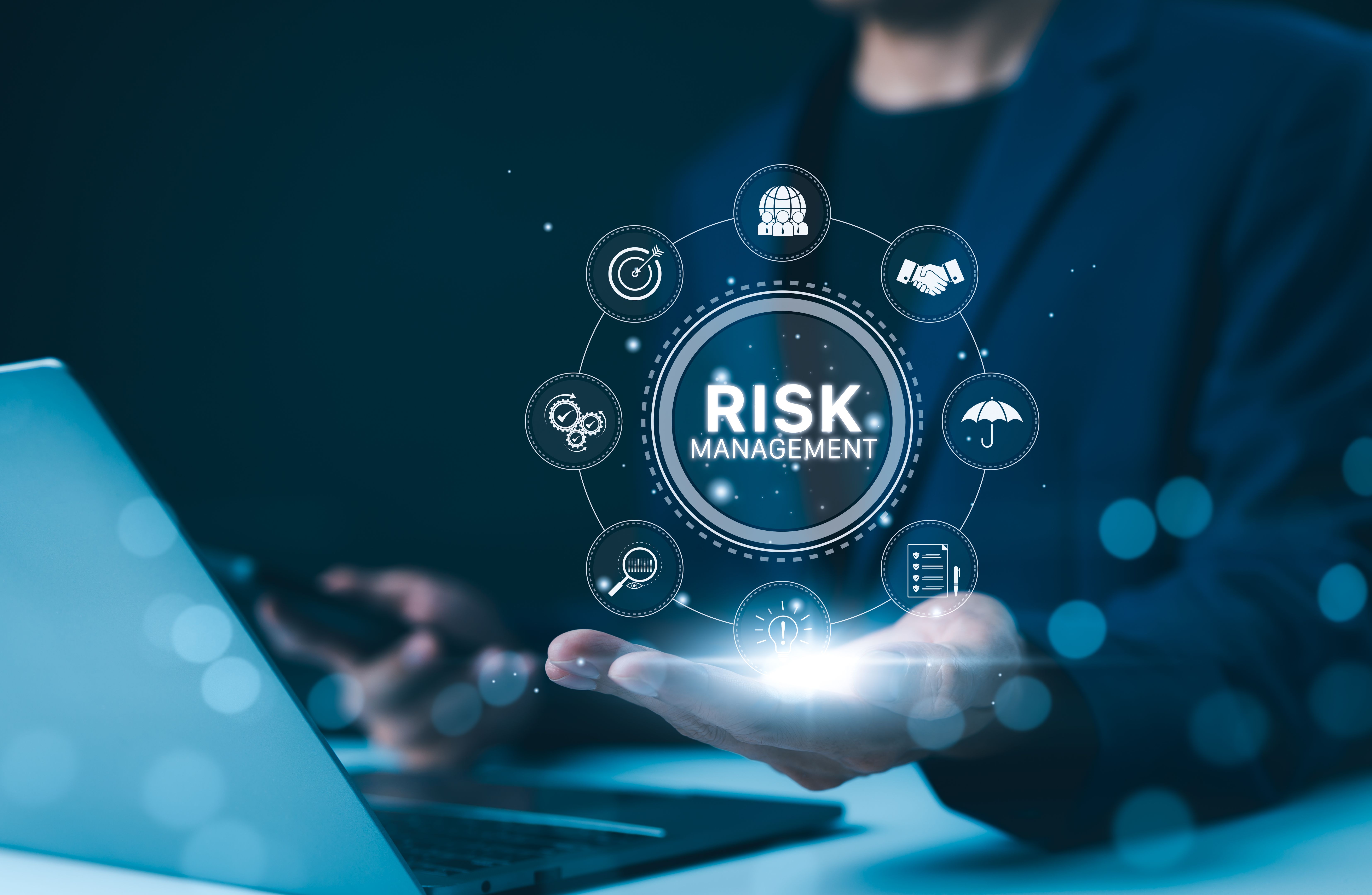 Corporate risk management strategy concept. Businessman showing virtual risk management interface with critical strategy icons. Analyze risk assessment, analysis financial, business risk, Company,