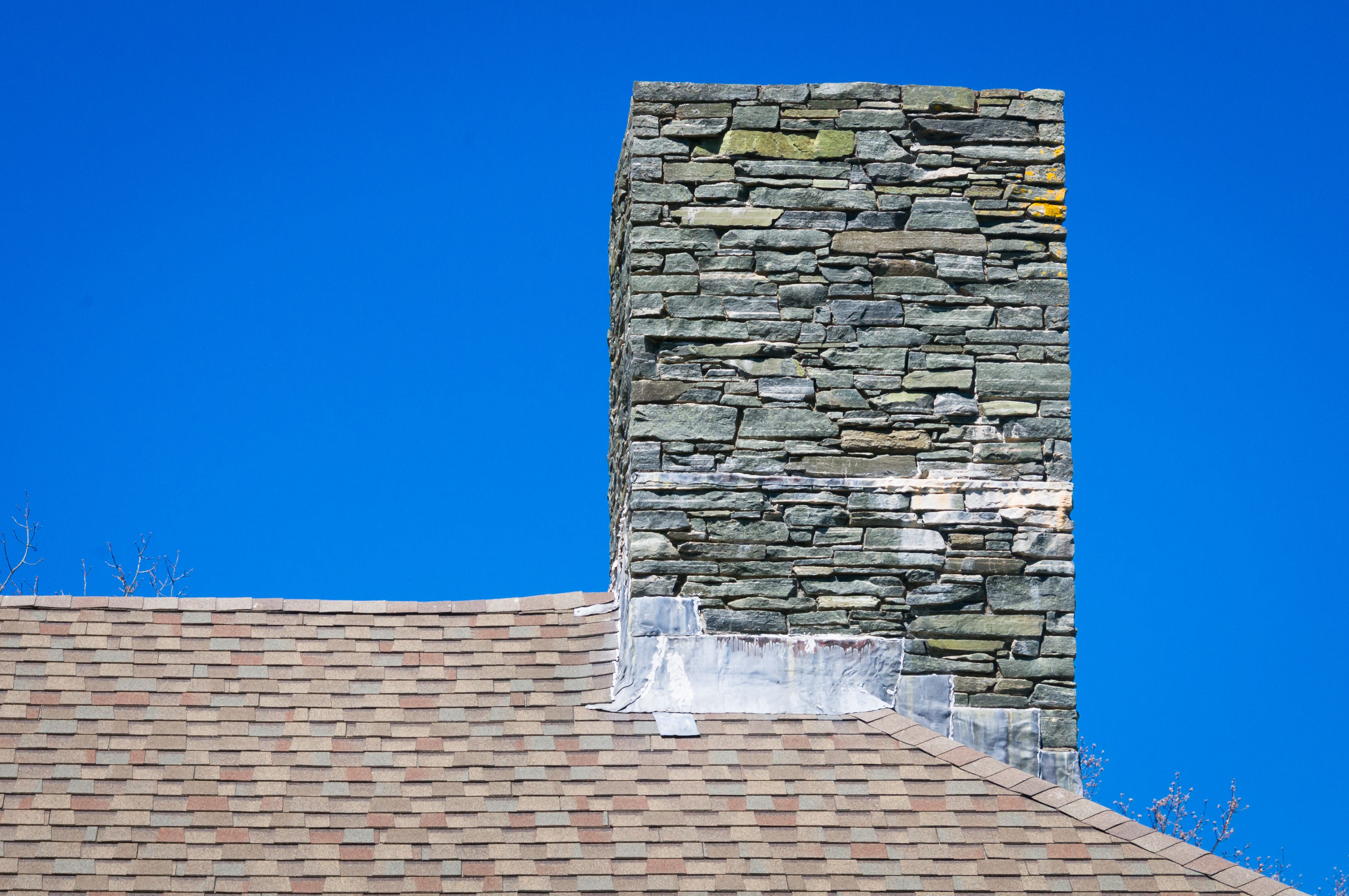 Lead Flashing on a Stone Chimney