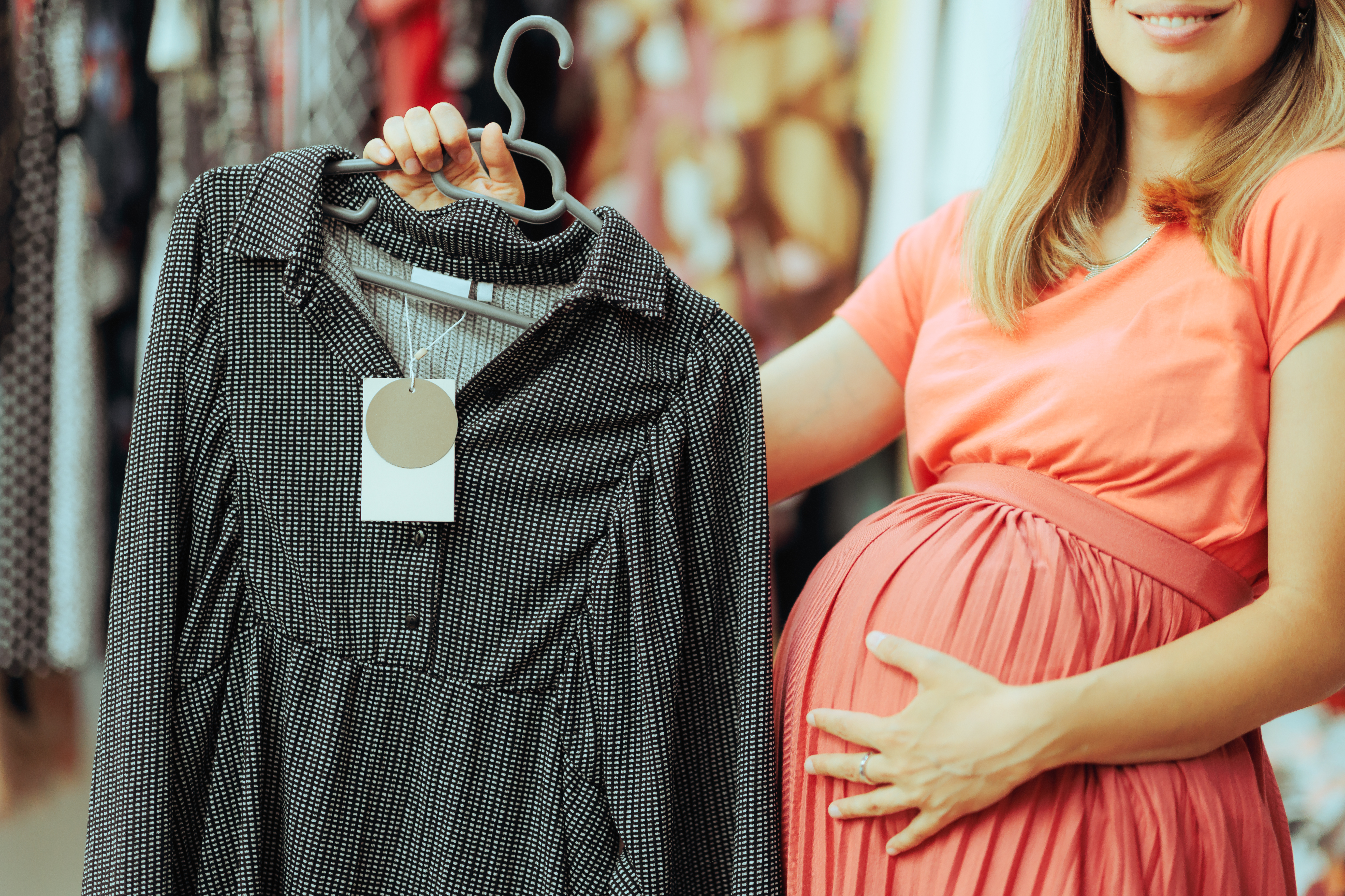 Pregnant Woman Buying Maternity Wear in a Fashion Store
