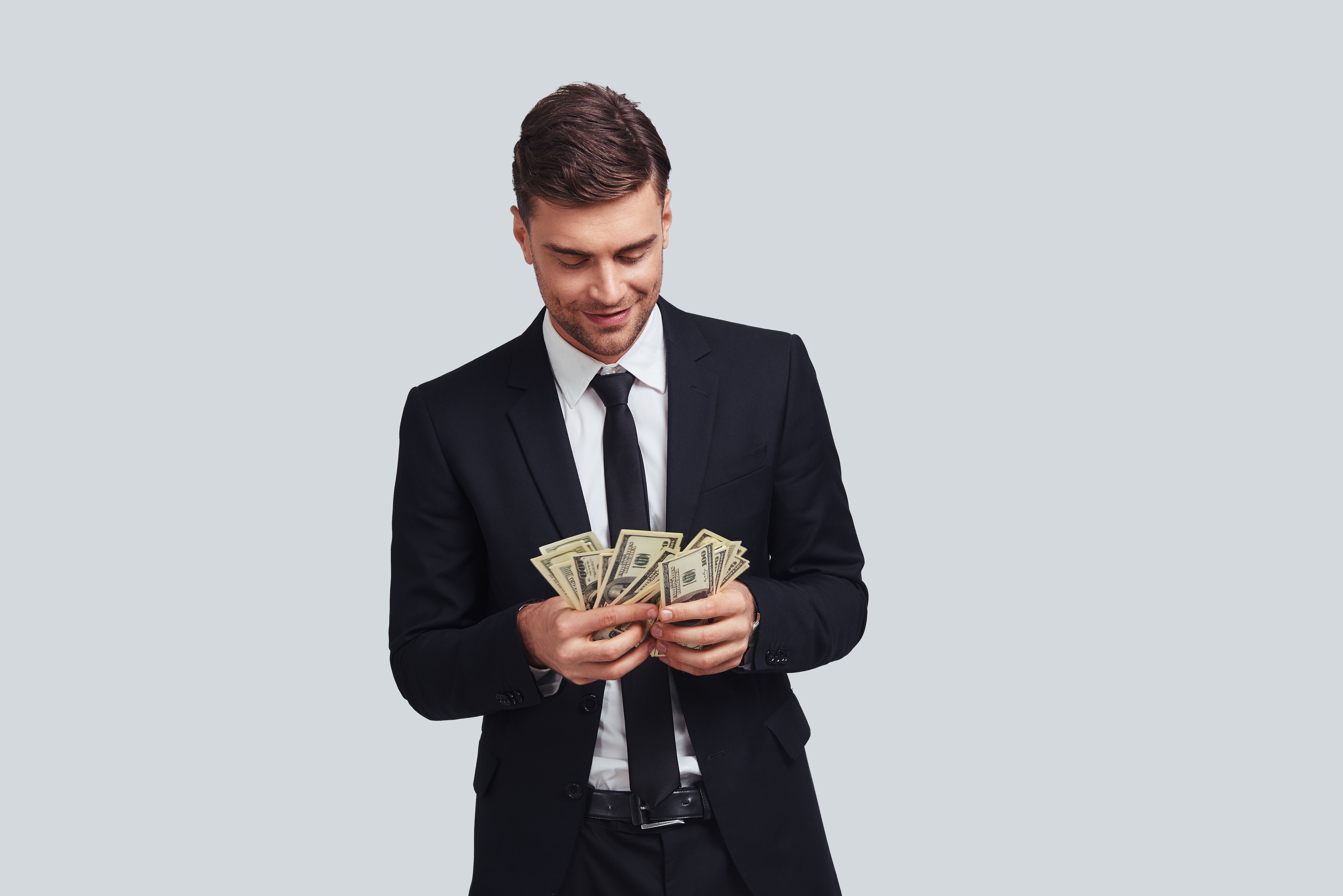 business person holding money