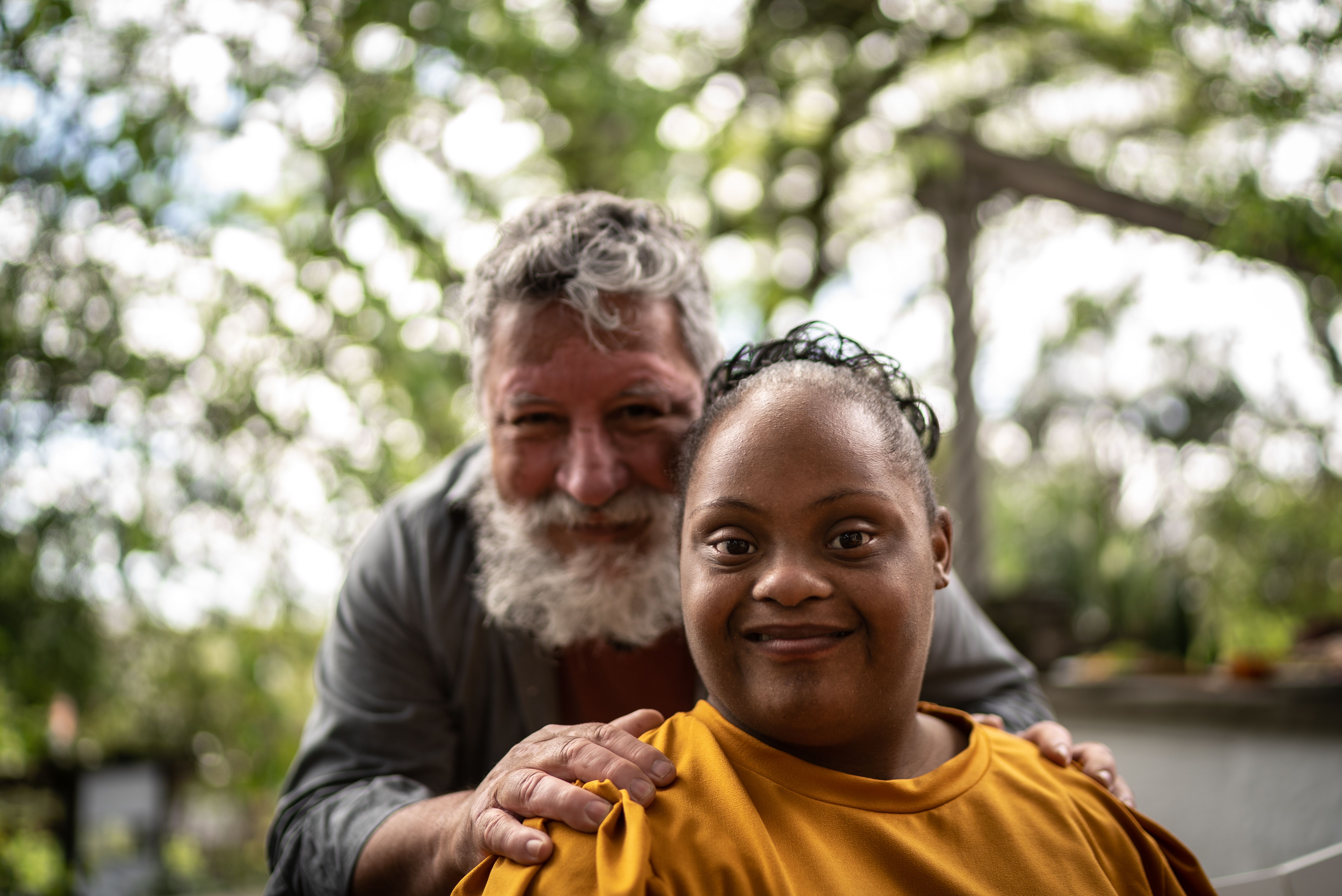 Portrait of a father and his daughter with special needs
